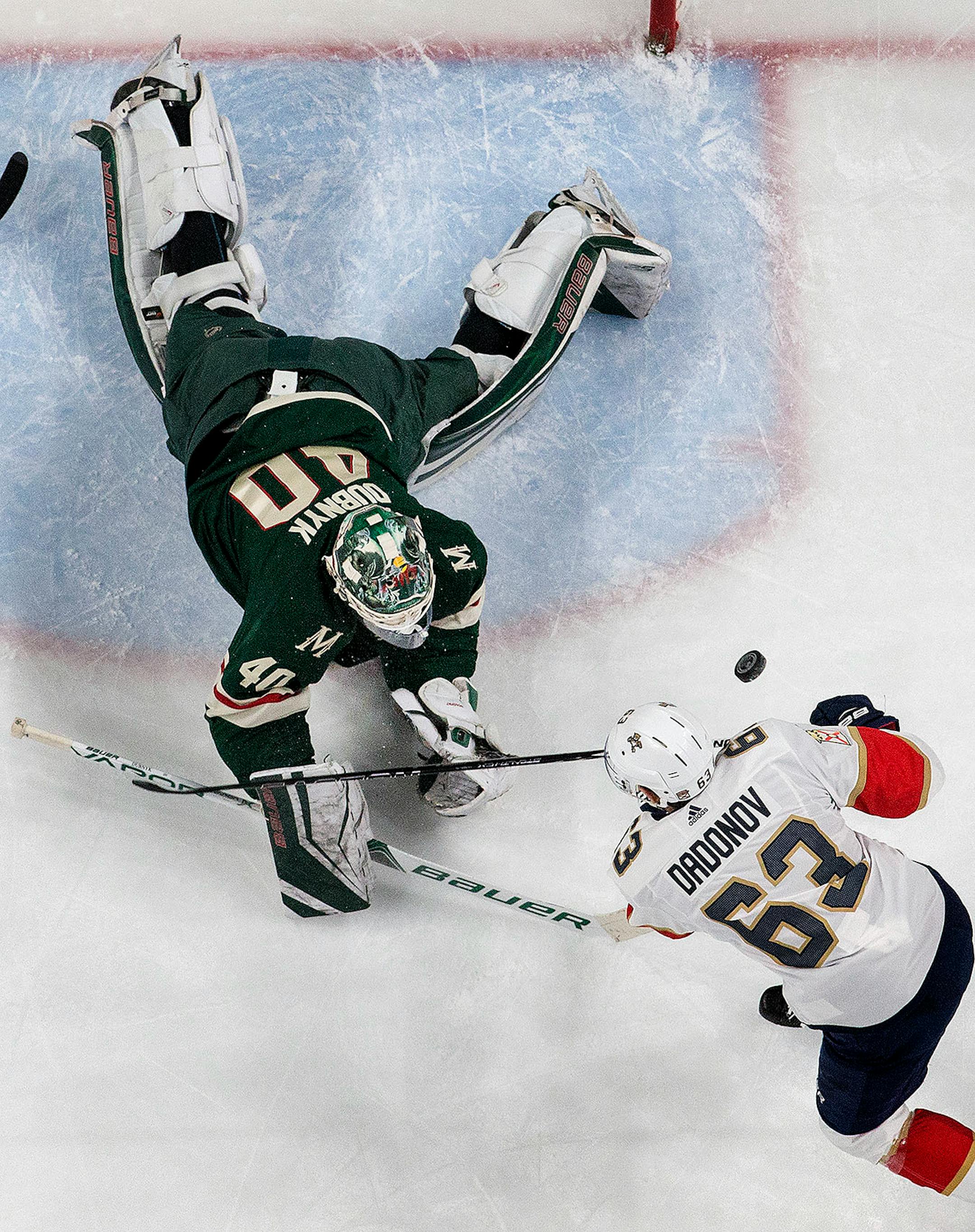 Wild goalie Devan Dubnyk (40) made a save on a shot by Evgeni Dadonov (63) in the second period.
