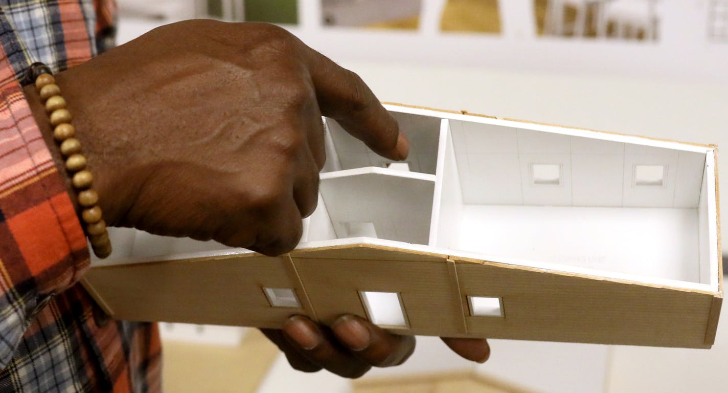 Formerly homeless and a member of Street Voices of Change, Freddy Toran, 55, shows a model of the housing and talks about the project at Wednesday, Oct. 31, 2018, at First Covenant Church in downtown Minneapolis, MN.] DAVID JOLES &#xef; david.joles@startribune.com An unusual alliance of people experiencing homelessness and county health officials want to develop Minnesota's first village of tiny homes, modeled after similar communities in the Southwest. Street Voices of Change, a 250-member nonp