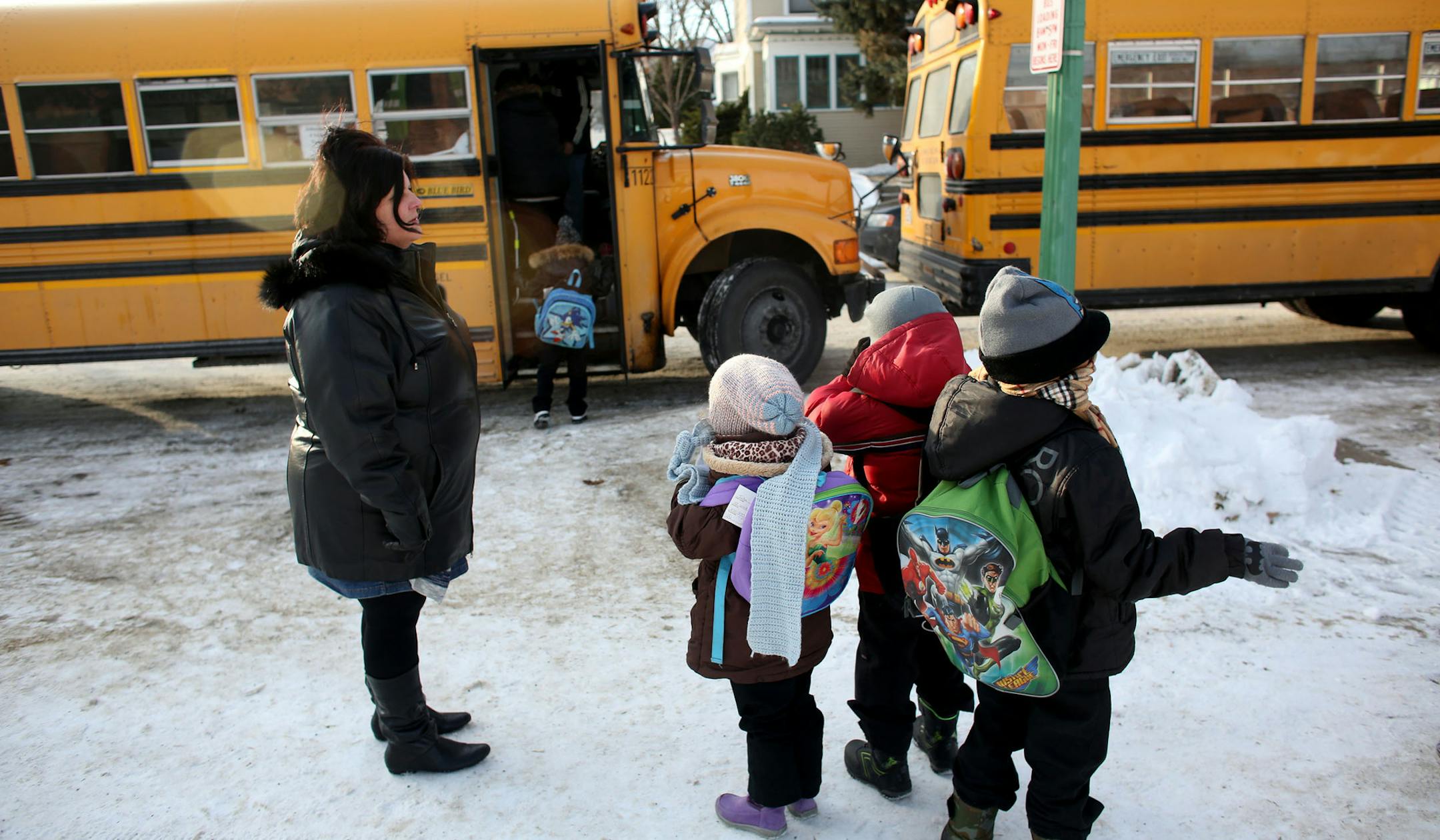 Kindergarten teacher Rita Karsten Waited with her students as they prepared to get on the bus home at the end of day at Four Seasons Elementary school in St. Paul Thursday, January 8, 2014. ] (KYNDELL HARKNESS/STAR TRIBUNE) kyndell.harkness@startribune.com