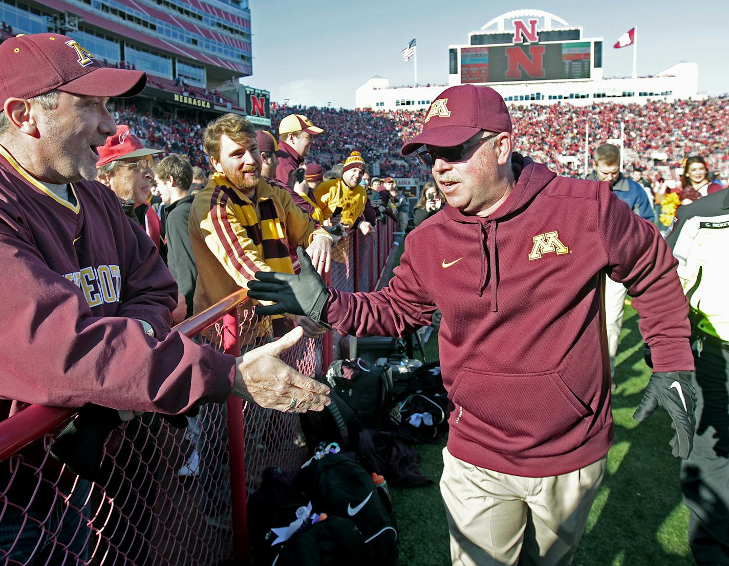 Minnesota's head coach Jerry Kill was greeted by fans as he celebrated the Gophers 28-24 win over Nebraska last season. The Goophers haven't been the same since.