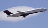 FILE- In this May 24, 2018, file photo a Delta Air Lines passenger jet plane, a Boeing 717-200 model, approaches Logan Airport in Boston. Delta Air Lines Inc. (DAL) on Thursday, Oct. 11, 2018, reported third-quarter earnings of $1.31 billion. (AP Photo/Charles Krupa, File)