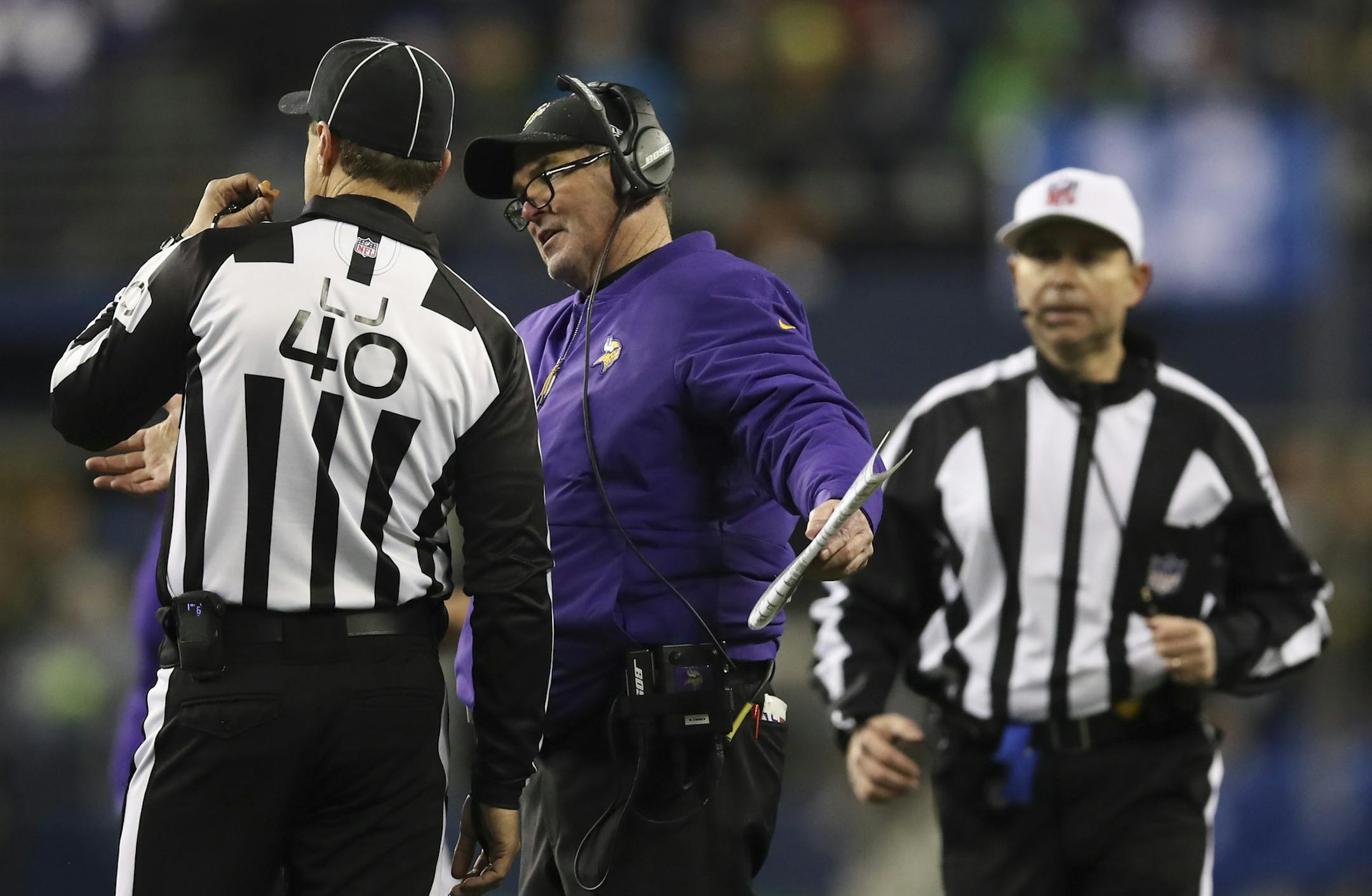 Minnesota Vikings head coach Mike Zimmer spoke with line judge Brian Bolinger in the fourth quarter. ] JEFF WHEELER ï jeff.wheeler@startribune.com The Minnesota Vikings lost to the Seattle Seahawks 21-7 in an NFL game Monday night, December 10, 2018 at CenturyLink Field in Seattle, WA.