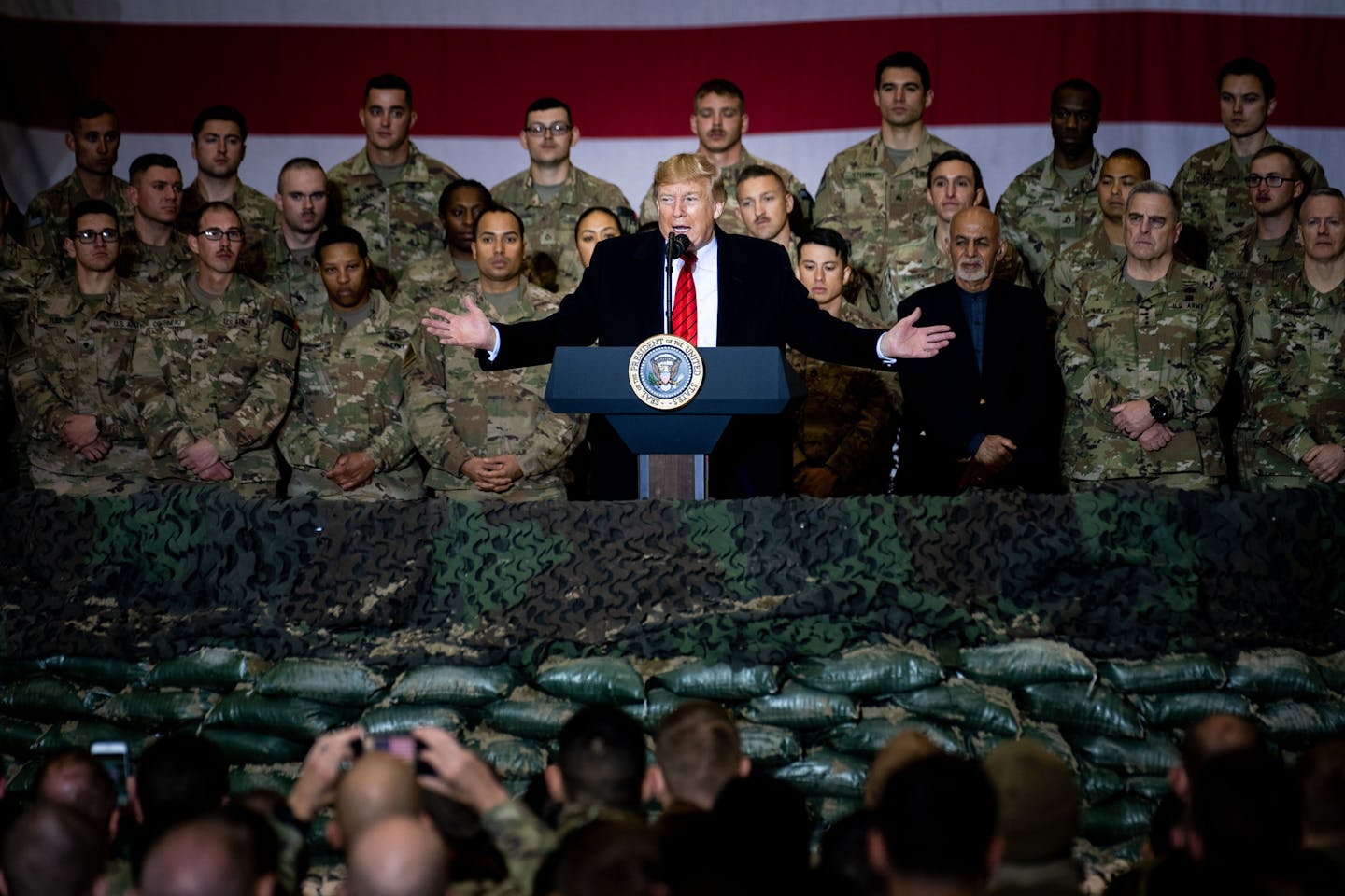 FILE -- President Donald Trump speaks to American troops at Bagram Air Field in Kabul, Afghanistan Nov. 28, 2019. Under an agreement with the Taliban, the withdrawal of U.S. troops &#x2014; about 12,000 are still in Afghanistan &#x2014; is dependent on the Taliban&#x2019;s fulfillment of major commitments, including its severance of ties with international terrorist groups such as al-Qaida. (Erin Schaff/The New York Times)