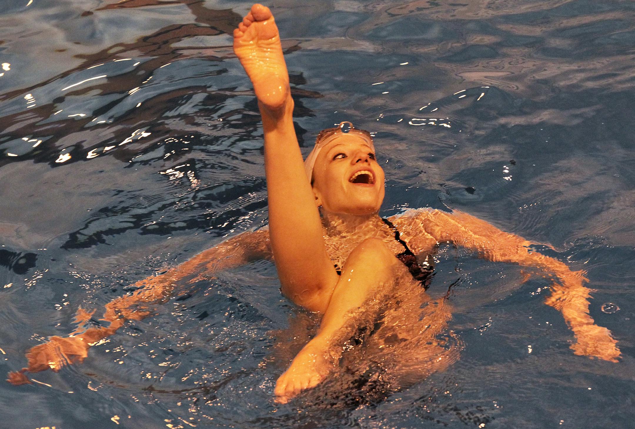 Maple Grove - Osseo synchronized swim team photographed during a recent practice session. Marisa Lee practice her flamingo routine. (MARLIN LEVISON/STARTRIBUNE(mlevison@startribune.com (cq all names coach Neumann)