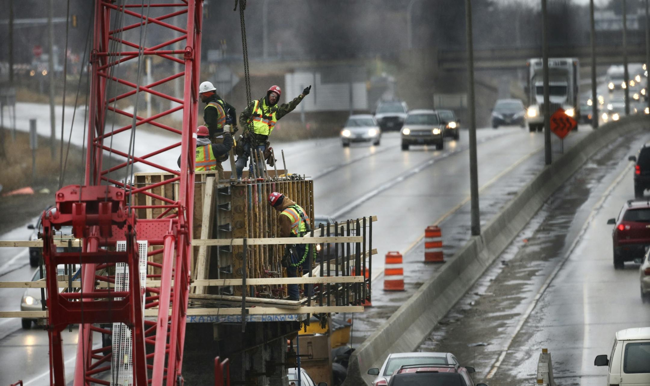 Seen from the Gateway State Trail bridge over I-35E, construction is in full gear on stretches of the interstate, including here, where the Arlington Street Bridge over I-35E is being rebuilt Thursday, April 3, 2014, in St. Paul, MN.