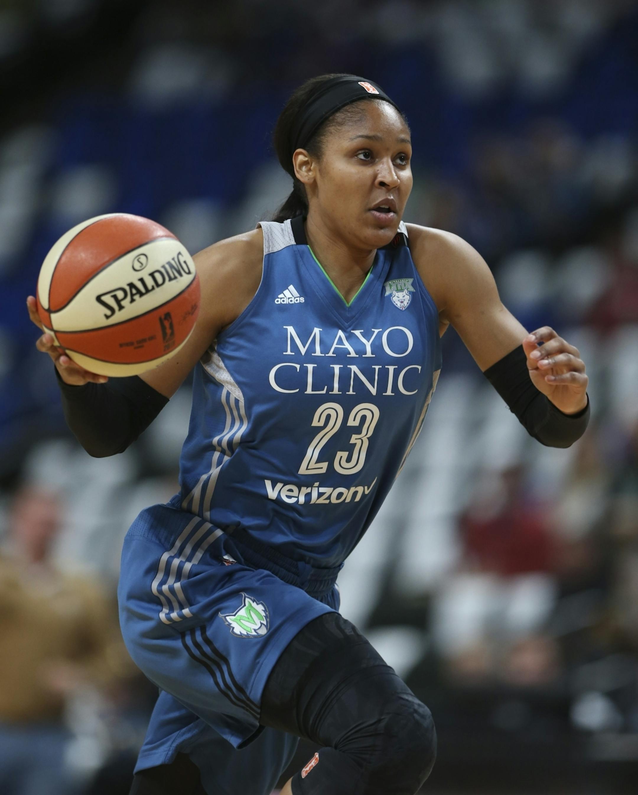 Minnesota Lynx forward Maya Moore (23) headed to the net for an easy layup after stripping the ball from Phoenix Mercury guard Marta Xargay (21) in the first quarter.