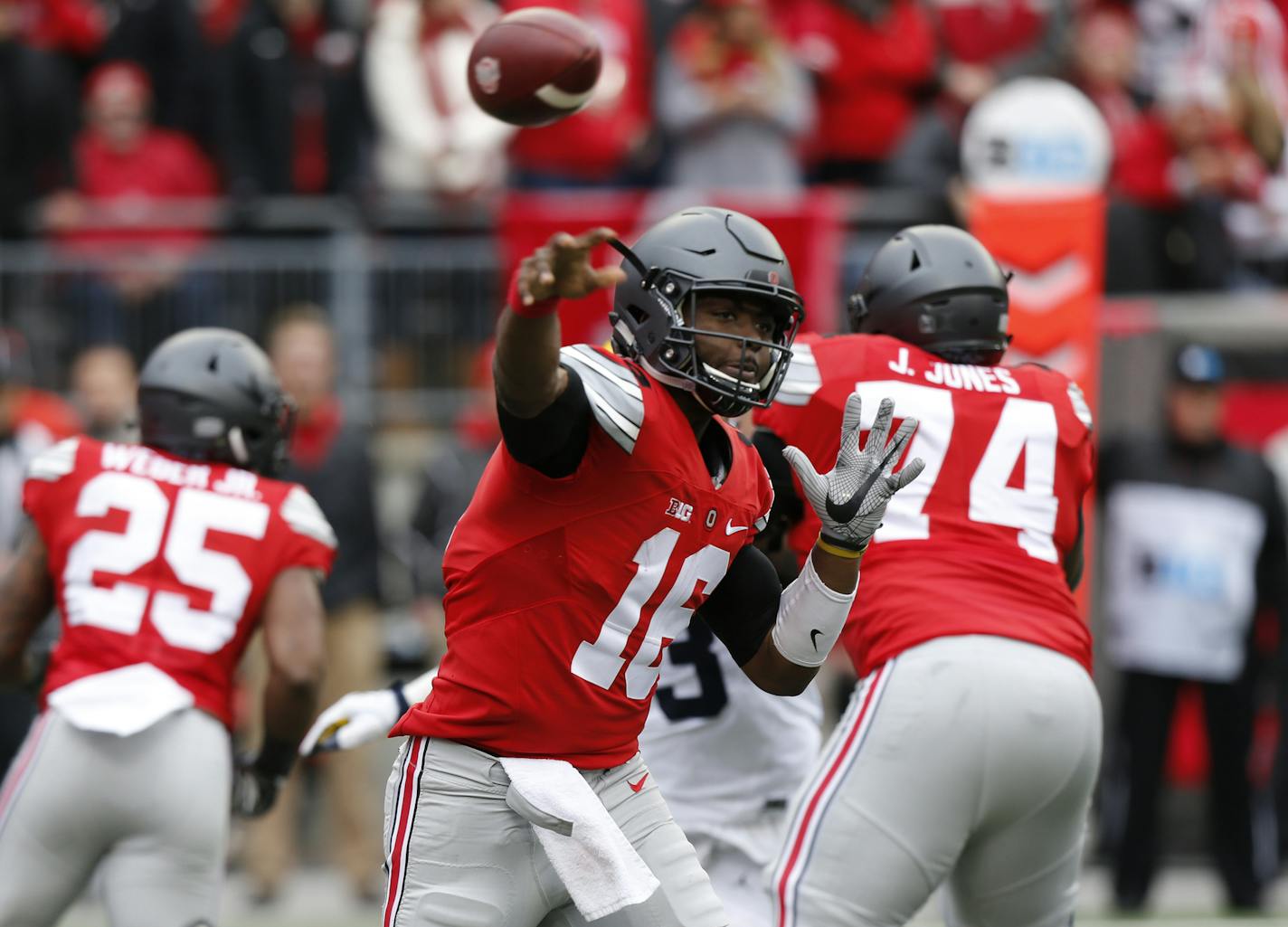 Ohio State quarterback J.T. Barrett plays against Michigan in an NCAA college football game Saturday, Nov. 26, 2016, in Columbus, Ohio. (AP Photo/Jay LaPrete)