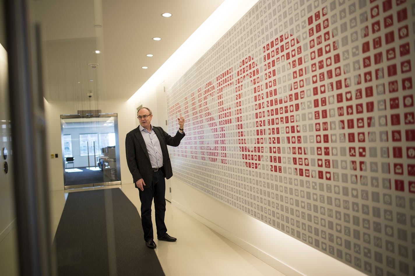 Chief Executive Michael Wethington of Minneapolis-based Outsell discussed the signage near the elevator entrance of his company&#x2019;s office.