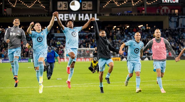 Minnesota United FC players celebrate at the end of the game Wednesday, Oct. 20 at Allianz Field in St. Paul, Minn.