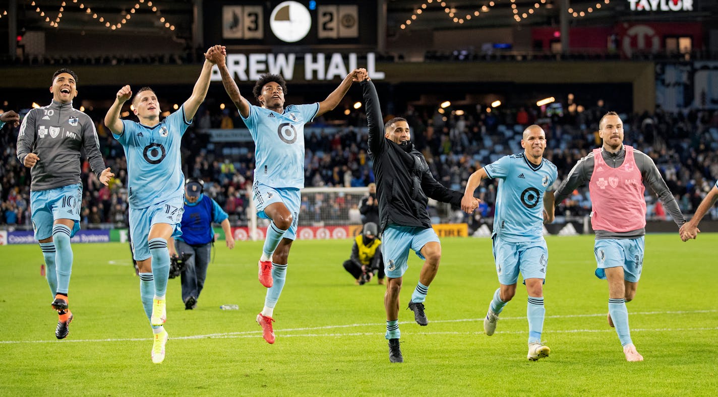 Minnesota United FC players celebrate at the end of the game Wednesday, Oct. 20 at Allianz Field in St. Paul, Minn.