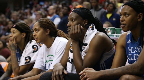 Sylvia Fowles (third from left) and the rest of the bench watched as their dreams to close out the WNBA Finals on Sunday faded in the second half.