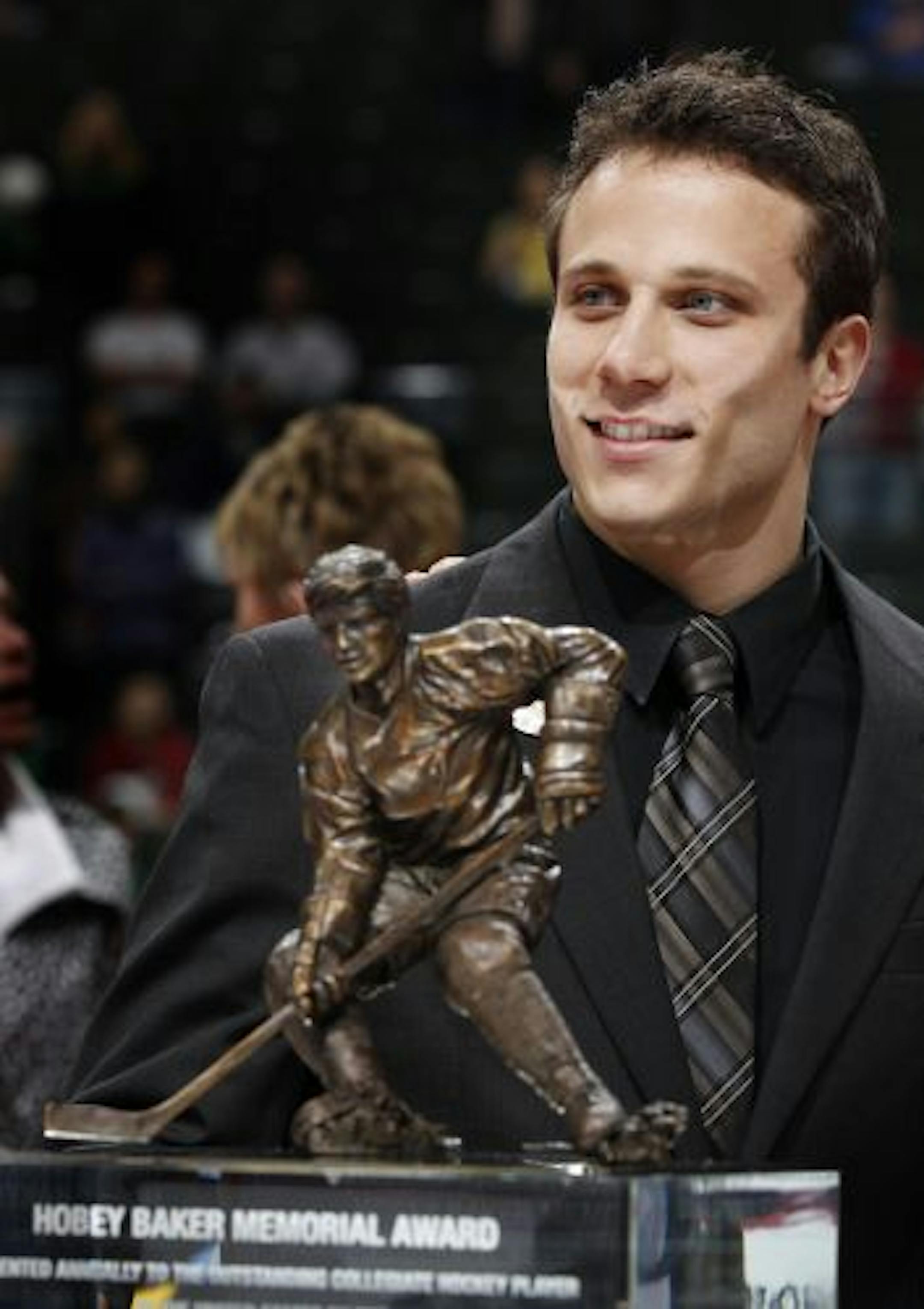 Miami University senior forward Andy Miele smiles after winning the Hobey Baker Memorial Award for the top NCAA hockey player in a ceremony in St. Paul, Minn. Friday April 8, 2011.