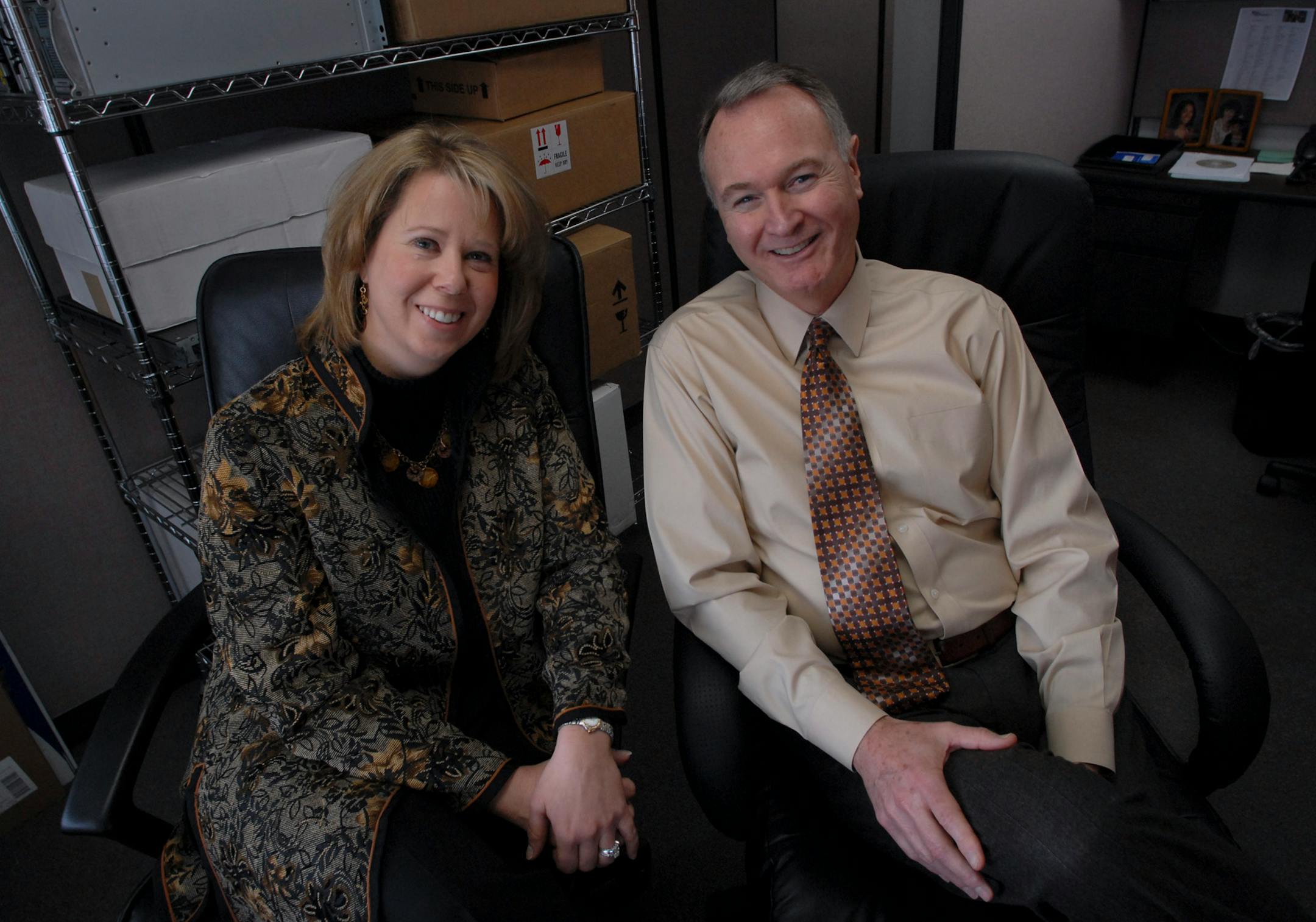 (Left to right) Sonia St. Charles and Paul Clifford of the Davenport Group. St. Charles is CEO and Founder and Clifford is president and founder of the company. They are married.