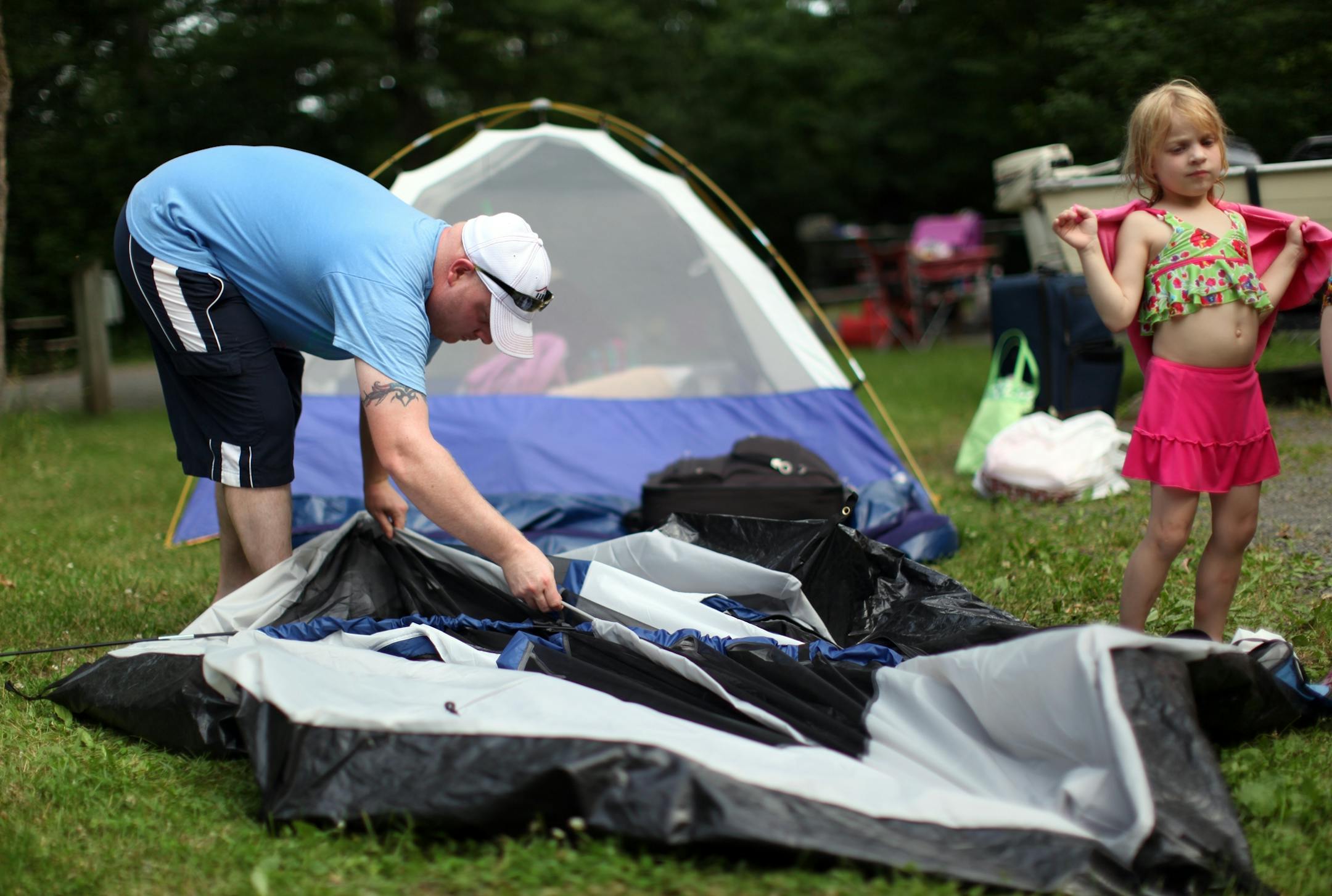 Nick Wright of New Hope packed up his family's campsite at William O'Brien State Park minutes before the scheduled 4 p.m. closing of the park due to a government shutdown Thursday. The family of four had arrived Wednesday and planned to stay through the weekend hoping the shutdown would be avoided.