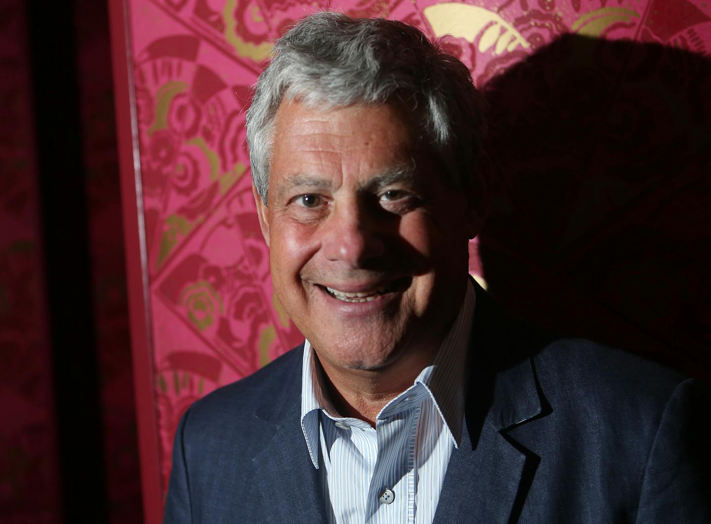 Cameron Mackintosh, producer of the musical Miss Saigon, poses for photographs in the Prince Edward Theatre in central London, Monday Sept 9, 2013. The new production makes its highly anticipated return to the West End in May 2014 at the Prince Edward Theatre, which is the musical&#x201a;&#xc4;&#xf4;s 25th Anniversary Year, and has played in 300 cities in 15 different languages. (Photo by Joel Ryan/Invision/AP) ORG XMIT: JRLON101