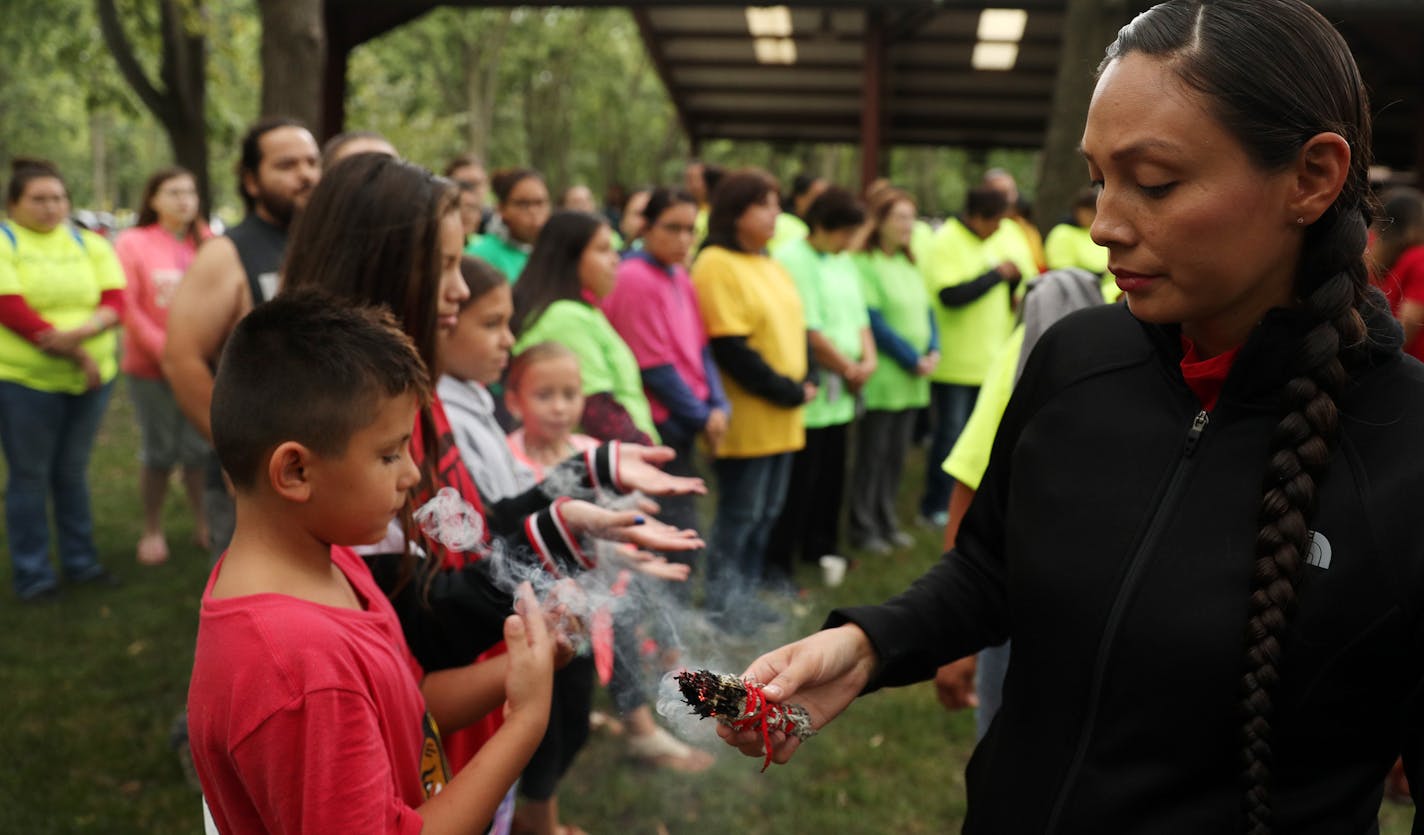 Community members took part in a sage burning ritual at Oak Grove Park prior to a prayer march for Savanna Greywind. ] ANTHONY SOUFFLE &#xef; anthony.souffle@startribune.com The mystery surrounding the fate of Savanna Marie Greywind, a pregnant, 22-year-old Fargo woman who went missing a week ago, took a bizarre and stunning twist Friday when authorities announced that they had found a healthy newborn, believed to be the woman's child, alive in an apartment where she was last seen.