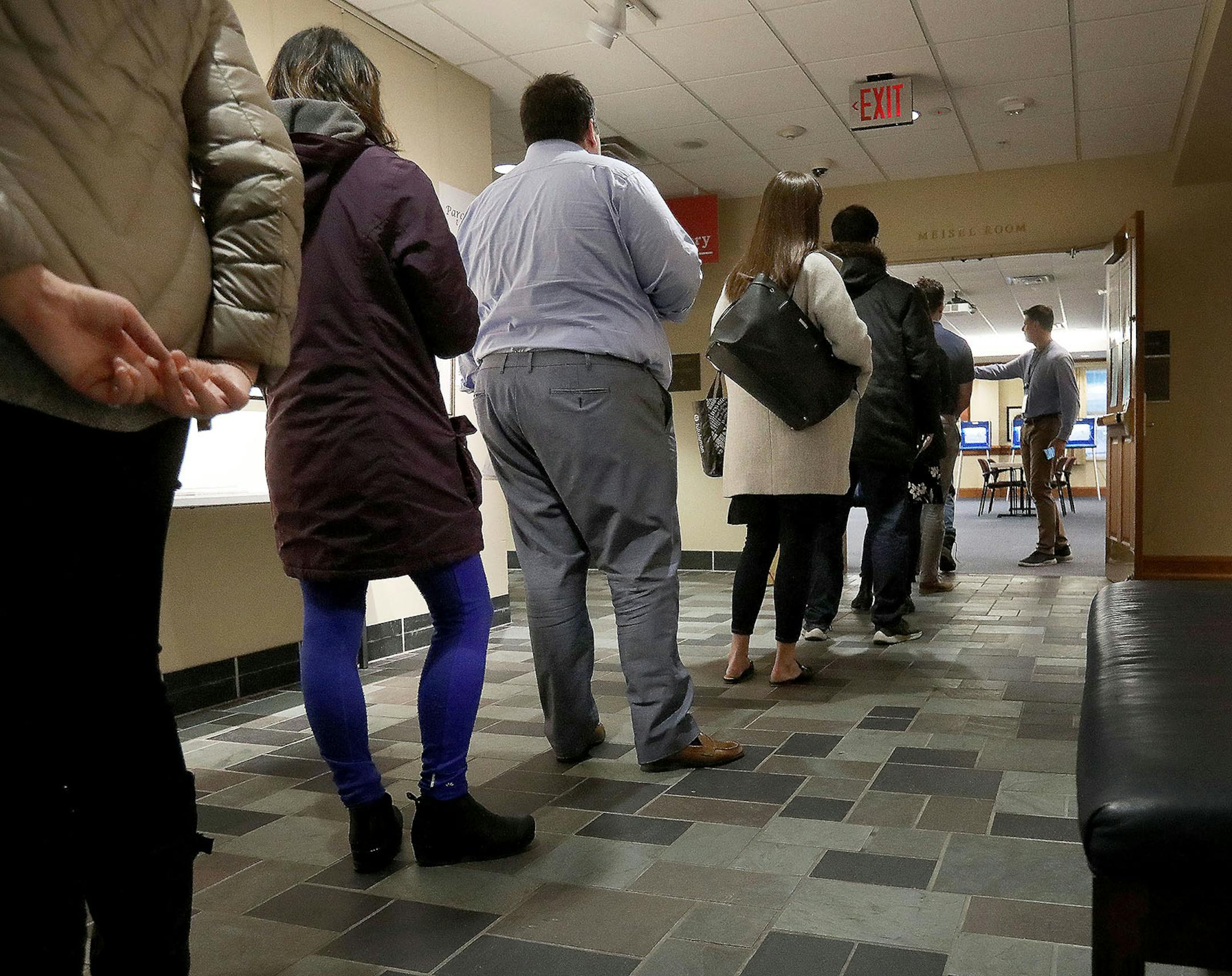 Voters formed a line at Westminster Presbyterian Church in downtown Minneapolis as the polls opened for the Minnesota presidential primary on Super Tuesday.