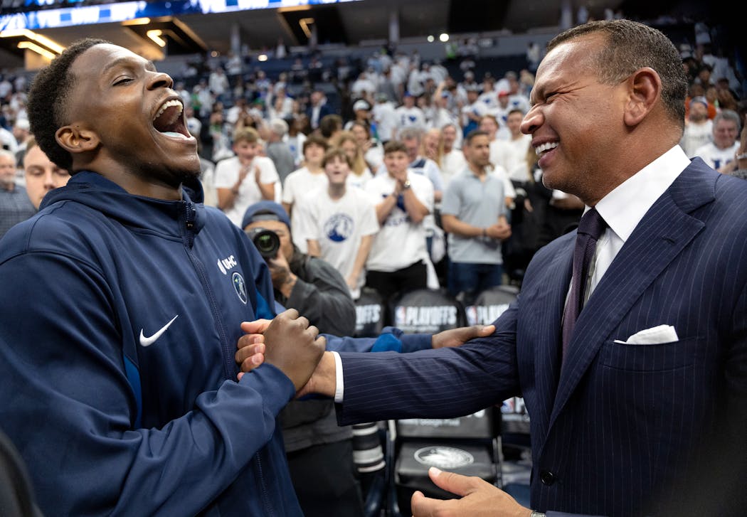 Anthony Edwards of the Timberwolves and Alex Rodriguez enjoy a moment at the end of the game of Game 6 of the NBA Western Conference Semi-finals at Target Center in Minneapolis on May 16.