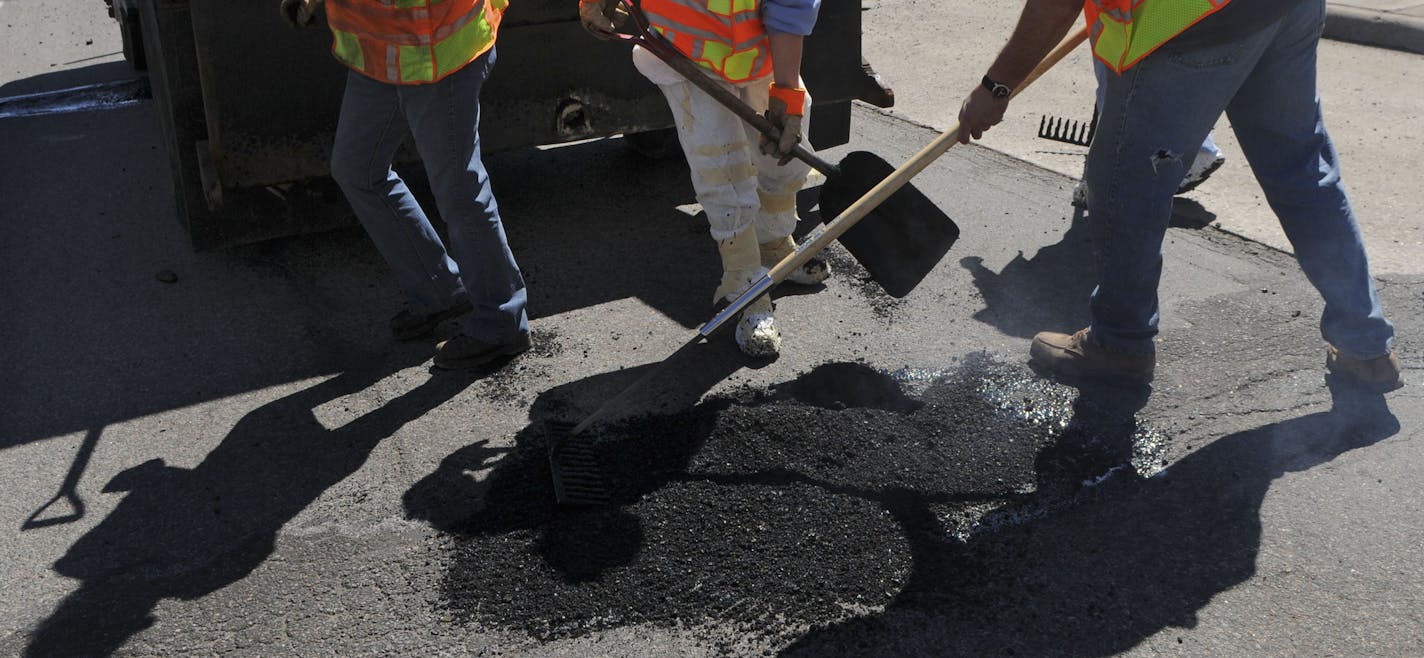 Richard Sennott/Star Tribune. Richard.Sennott@startribune.com Minneapolis Mn. Tuesday 04/05/11 ] City road crews began permanent patching along South 8th St. in downtown Minneapolis. Extraordinary weather conditions this winter resulted in a significant pothole problem across the metro area. In Minneapolis, crews worked all winter to temporarily patch potholes when they could, with the bulk of the work occurring since February. With warmer weather and asphalt plants now open for the season, Minn