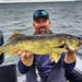Twin Cities angler Cory Villaume bought his first forward-facing sonar unit about four years ago. Here, Villaume's friend, Justin Wathke, holds a wall