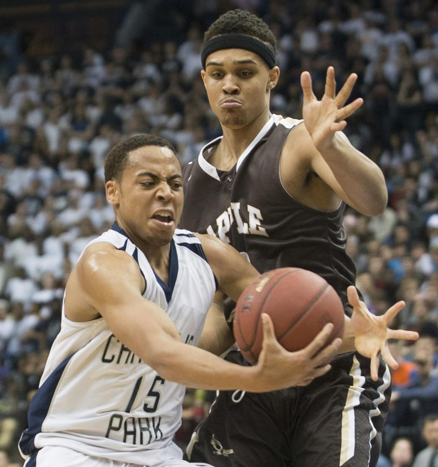 Champlin Park guard JT Gibson (15) drives toward the basket while being defended by Apple Valley guard Gary Trent Jr. (2) in the first half. ] (Aaron Lavinsky | StarTribune) Champlin Park takes on Apple Valley in the Class 4A boys' basketball championship game on Saturday, March 14, 2014 at Target Center.