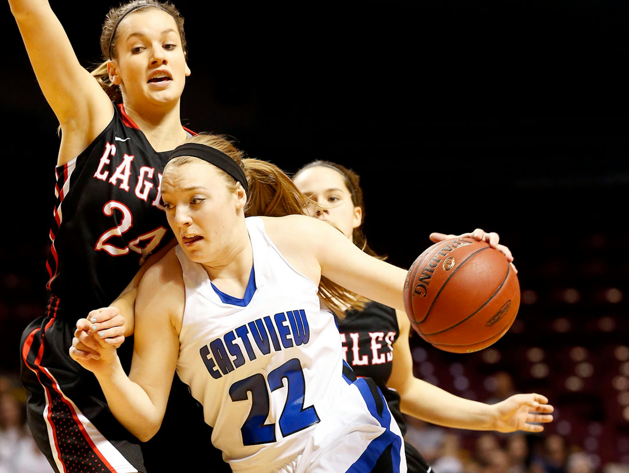 Madison Guebert (22) of Eastview was defended by Martha Kuderer (24) of Eden Prairie in last year's state tournament. (Carlos Gonzalez, Star Tribune)