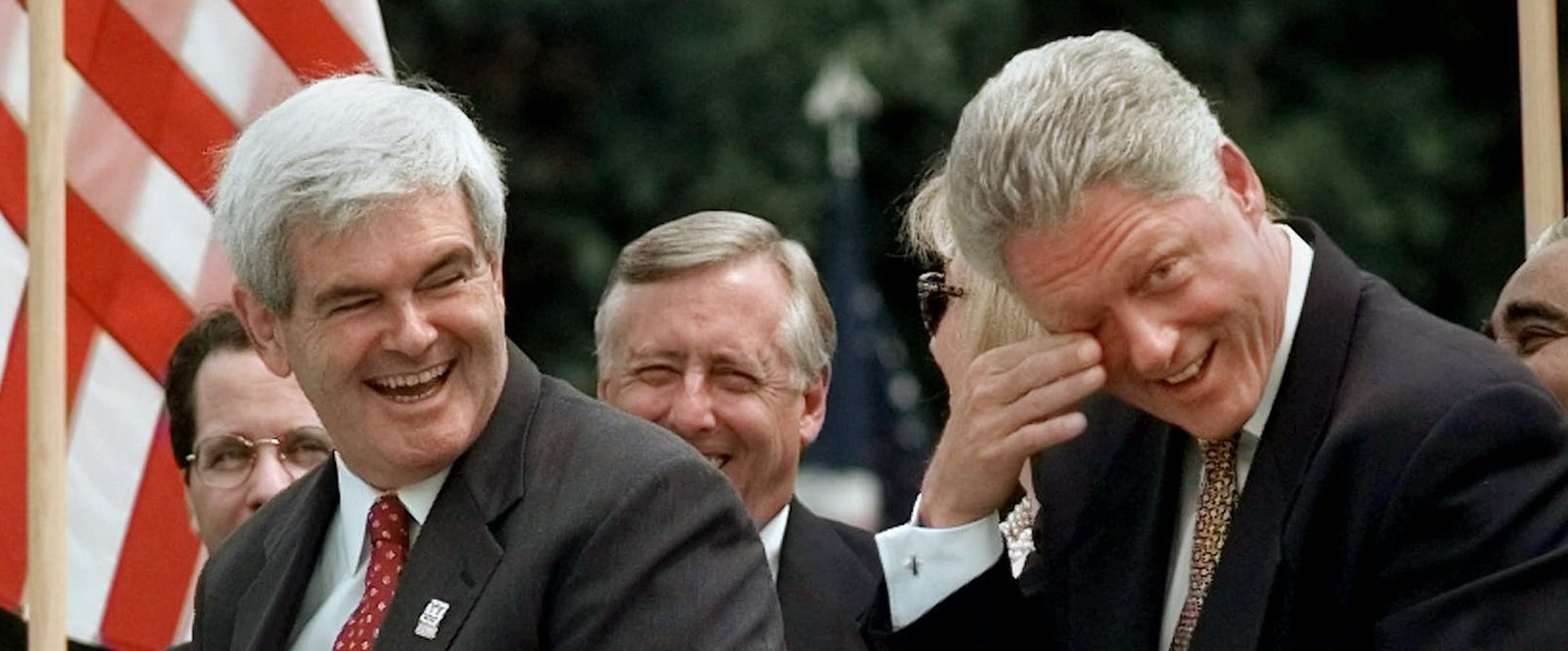House Speaker Newt Gingrich of Ga. and President Clinton share a laugh on the South Lawn of the White House Tuesday Aug. 5, 1997 where the president signed the balanced budget bill. Rep. Steny Hoyer, D-Md., looks on at center. (AP Photo/Ruth Fremson)