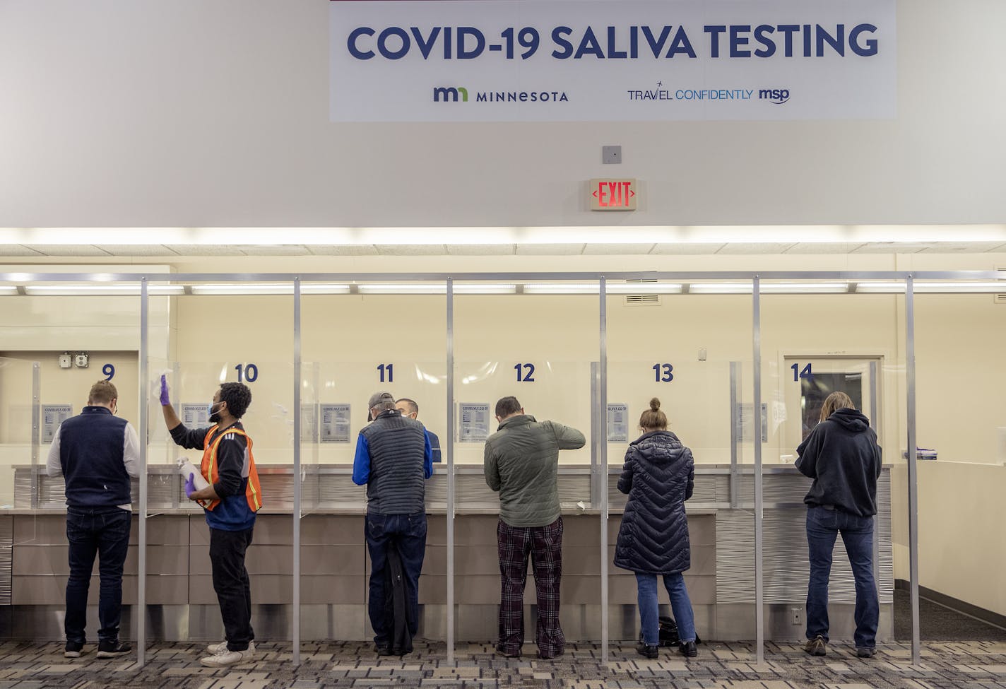 People at the saliva COVID-19 testing site at the Minneapolis-St. Paul International Airport, Thursday, November 12, 2020.