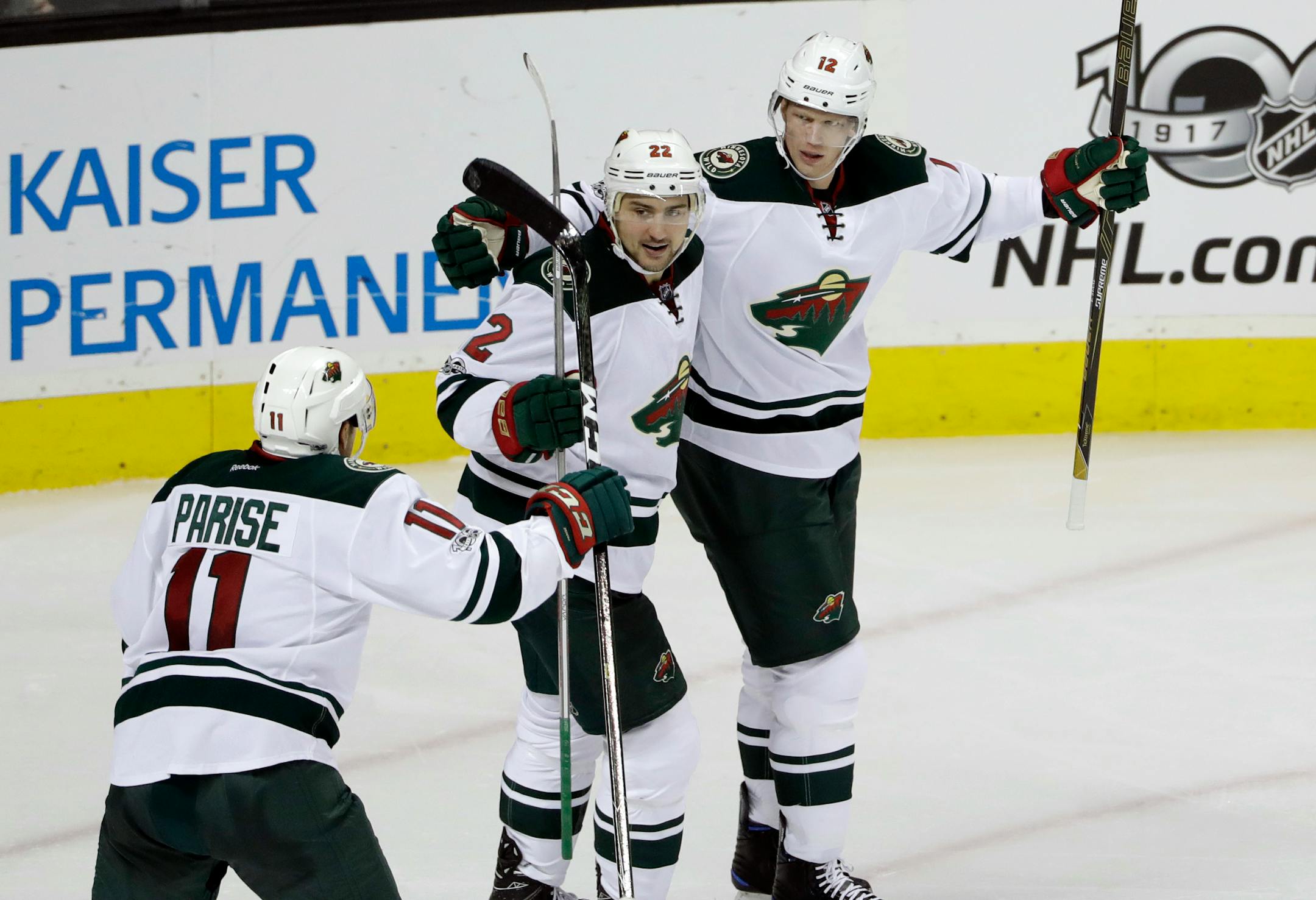 Minnesota Wild center Eric Staal (12) celebrates his goal with teammates Nino Niederreiter (22) and Zach Parise (11) during the third period of an NHL hockey game against the San Jose Sharks Thursday, Jan. 5, 2017, in San Jose, Calif. Minnesota won 5-4. (AP Photo/Marcio Jose Sanchez)