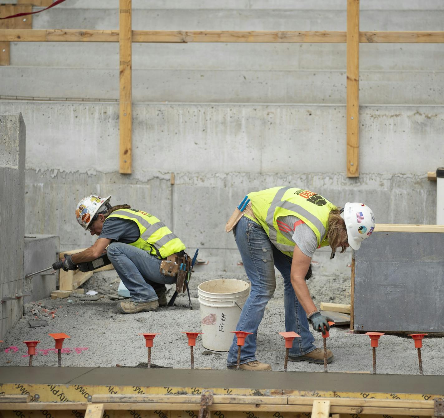 Beth Bombardo chiseled concrete inside the Allianz Stadium while Kelly Wallin capped rebar protruding from freshly poured concrete. Bombardo has been a laborer for more than 20 years, the past 18 or so with M.A. Mortenson Co. Wallin has worked for the company for the last four years. ] JEFF WHEELER &#xef; jeff.wheeler@startribune.com M.A. Mortenson Co. and other construction companies' efforts to increase gender and ethnic diversity in the workplace in the wake of the #metoo and other movements.