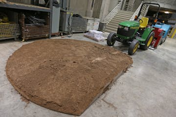 One of the Metrodome pitching mounds and field machines photographed on 7/19/13. In the market for a 10-year-old batting cage with more than a few scu