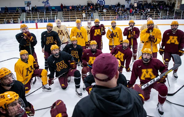 Gophers coach Bob Motzko spoke to players at a January practice at Fogerty Arena in Blaine.