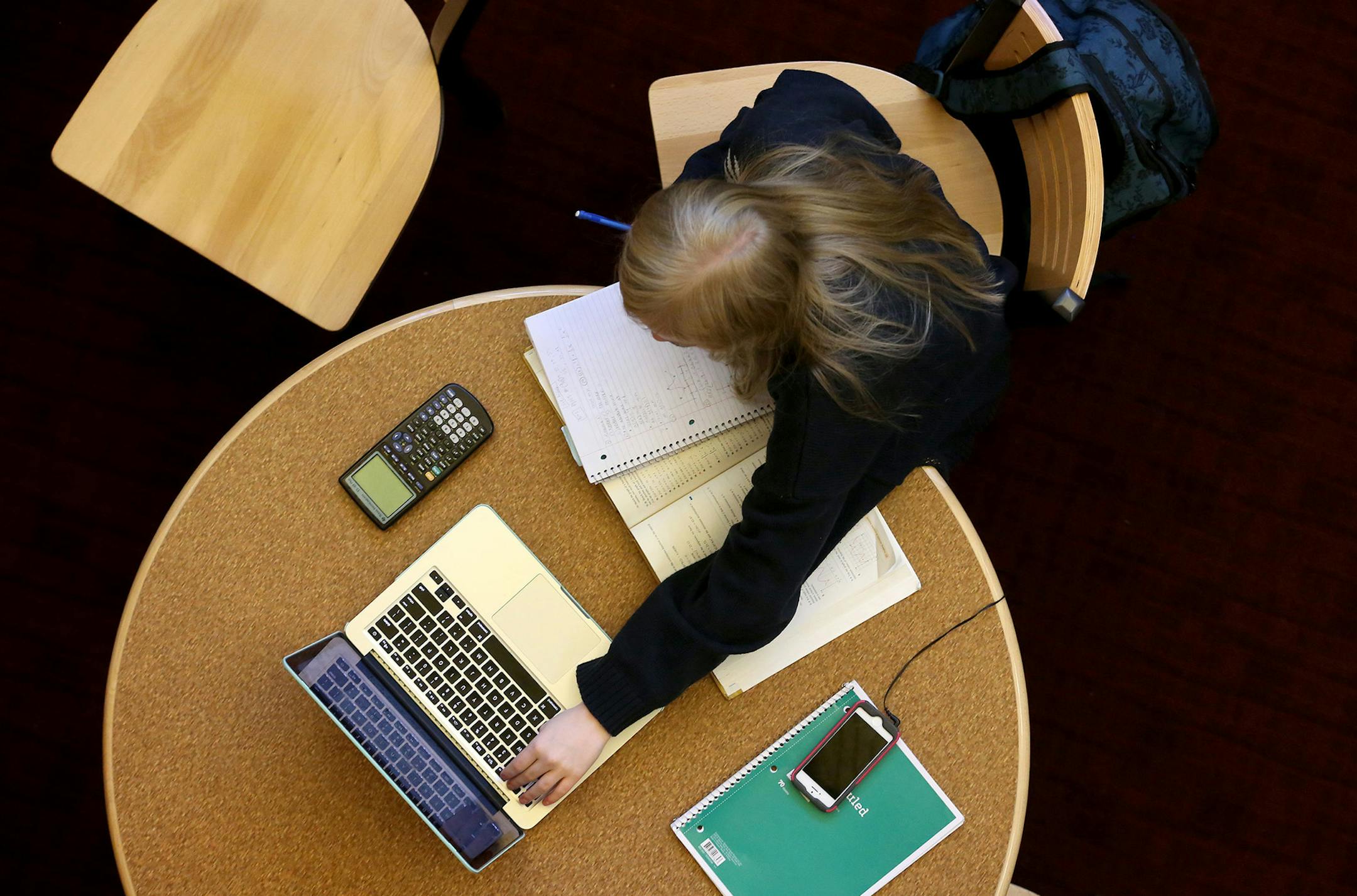 Emma Brodigan, junior, worked on m math homework during her online government class. Whether its an online class, normal free hour or a flex time do to a teachers absence students are responsible for managing their own time. ] (KYNDELL HARKNESS/STAR TRIBUNE) kyndell.harkness@startribune.com A look at flex time at Chanhassen High School in Chanhassen Min., Tuesday November 3, 2015. ORG XMIT: MIN1511041632420066