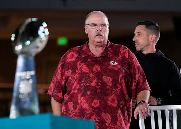 Kansas City Chiefs' coach Andy Reid, left, stands next to San Francisco 49ers coach Kyle Shanahan during Opening Night for the NFL Super Bowl 54 footb