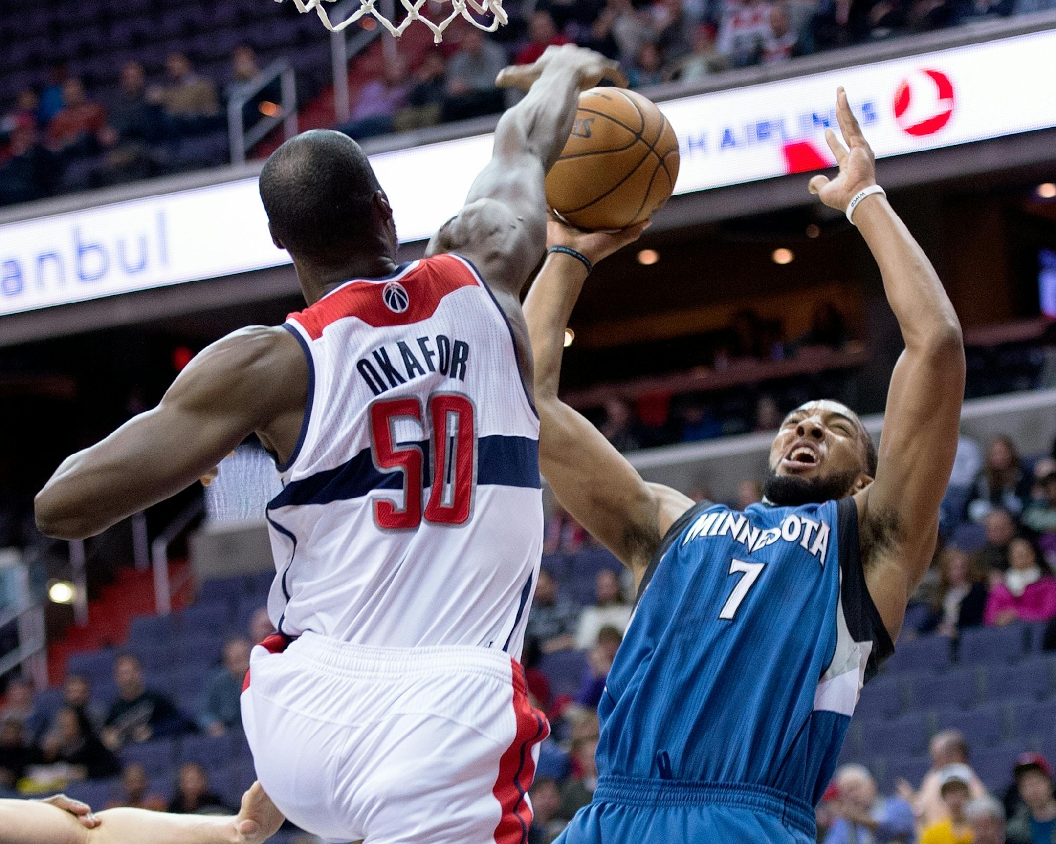 Washington Wizards center Emeka Okafor (50) blocks the shot of Minnesota Timberwolves power forward Derrick Williams (7) during the first half of their game played at the Verizon Center in Washington, D.C., Friday, January 25, 2013.
