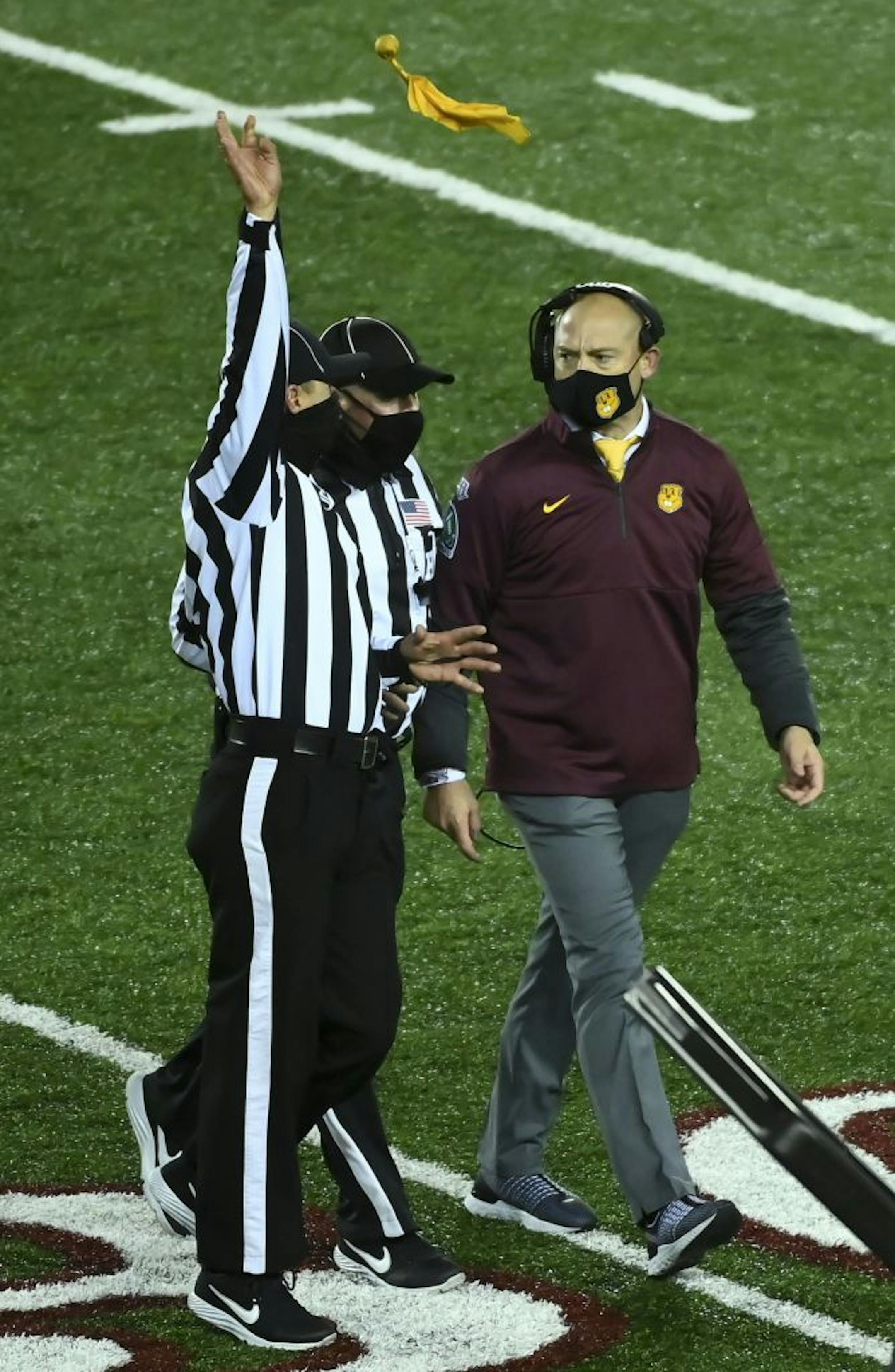 Officials called a penalty against Minnesota Gophers head coach P.J. Fleck after he argued another penalty for a blindside block called against his team in the first quarter against the Iowa Hawkeyes.