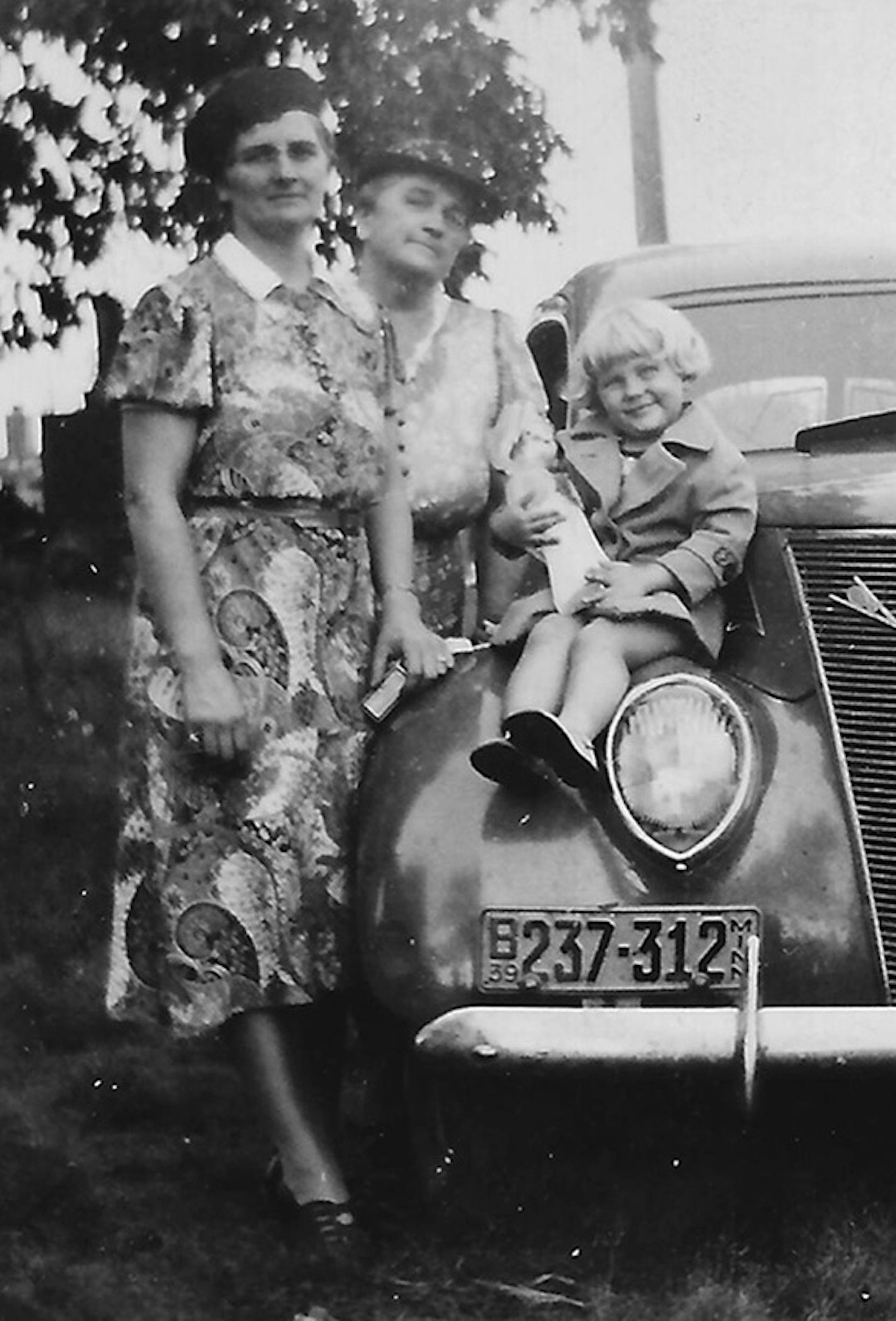 One of my favorite photos of "Me and My Mom" was the day we went to the Minnesota State Fair. Yes, this photo includes my grandmother, my sister and my father, but they complete the story in the image. After all, isn't the mother the center of the entire family? I grew up on a farm in Roseland, MN (pop. less than 100). This photo was taken 77 years ago in 1939 (see car license plate), but I hope you will consider using it to round out the role of the mother through time. (Note: the hats and my m