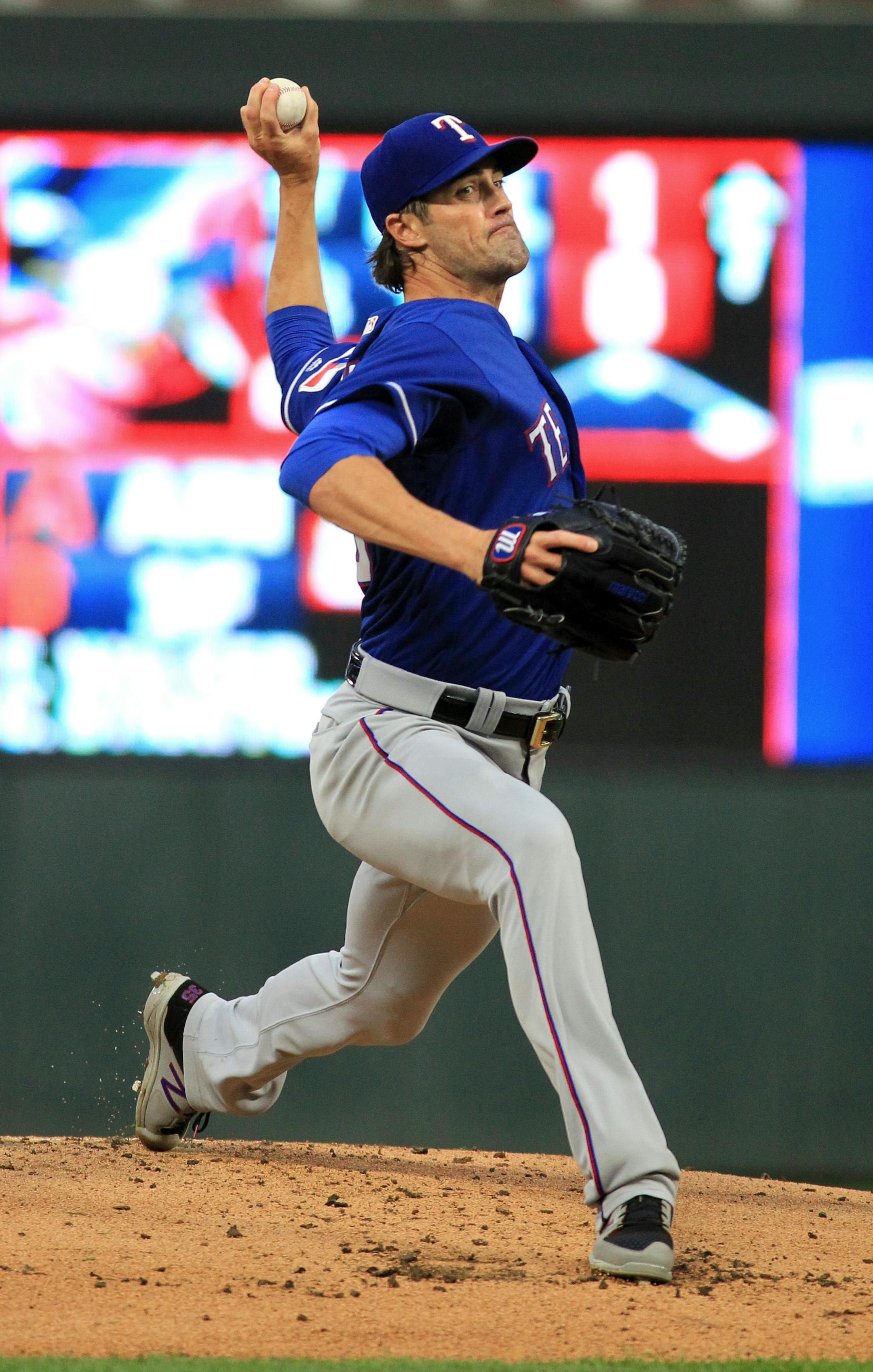 Texas Rangers pitcher Cole Hamels throws to a Minnesota Twins batter during the first inning of a baseball game Saturday, Aug. 5, 2017, in Minneapolis. (AP Photo/Andy Clayton-King)