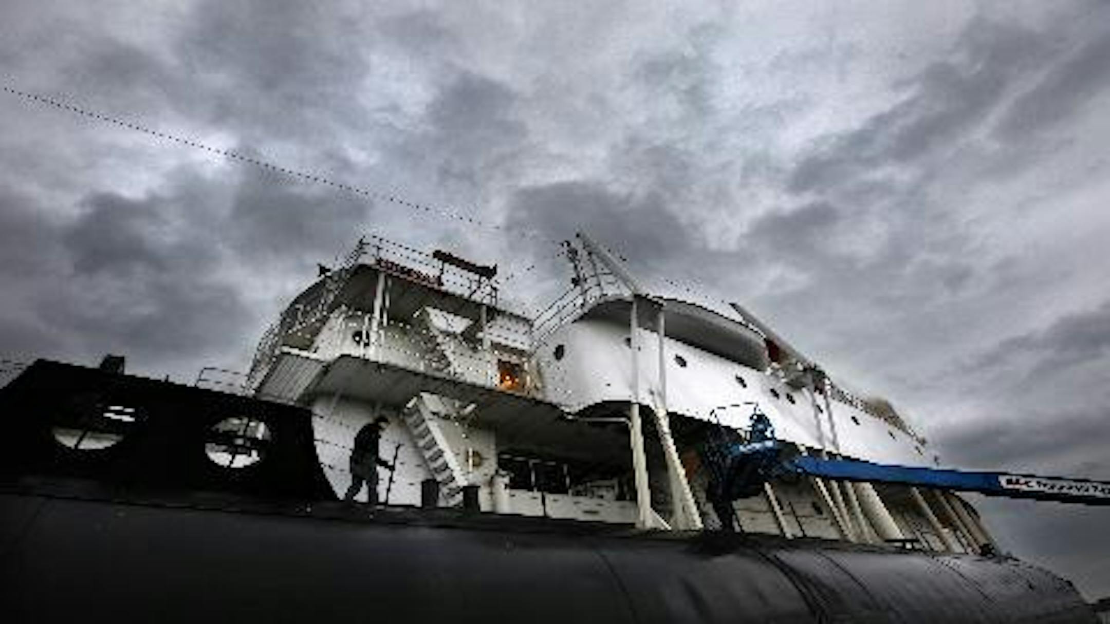 BRIAN PETERSON � brianp@startribune.com SUPERIOR, WI - 4/30/2011 - For 7 years, almost always in bad weather, a eclectic group of boat lovers have spent one weekend each year welding rust holes, scrapping and painting the 105-year-old S.S. Meteor � the Great Lakes� last whaleback steamer.