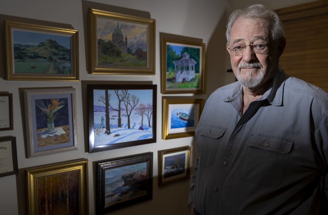 Keith Wilcock, photographed by paintings of his and other artists in his studio. Wilcock an 84-year-old art collector who has roughly 300 works of paintings and sculptures that are mostly from Minnesota artists.