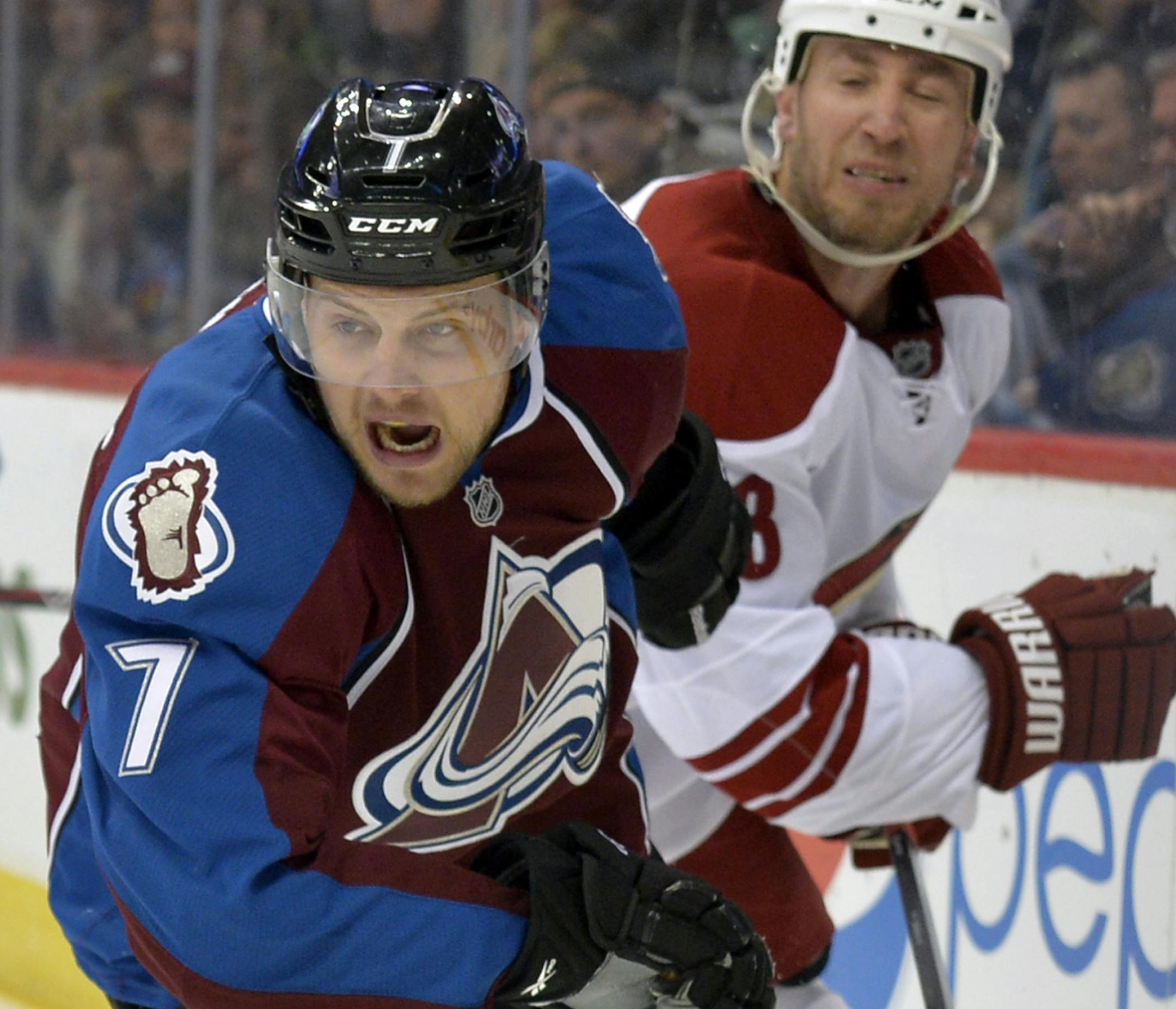 Colorado Avalanche center John Mitchell skates against the Phoenix Coyotes during an NHL hockey game, Friday, Feb. 28, 2014, in Denver. Colorado beat Phoenix 4-2. (AP Photo/Jack Dempsey) ORG XMIT: OTK