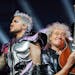 Adam Lambert and Brian May, the lead guitarist of Queen, performed “Hammer to Fall” as part of the Rhapsody Tour featuring Queen + Adam Lambert on