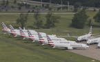 In a May 24, 2019 aerial photo, American Airlines 737 Max are stored at Tulsa International Airport. Boeing Co. said Monday, Dec. 16, 2019 that it wil