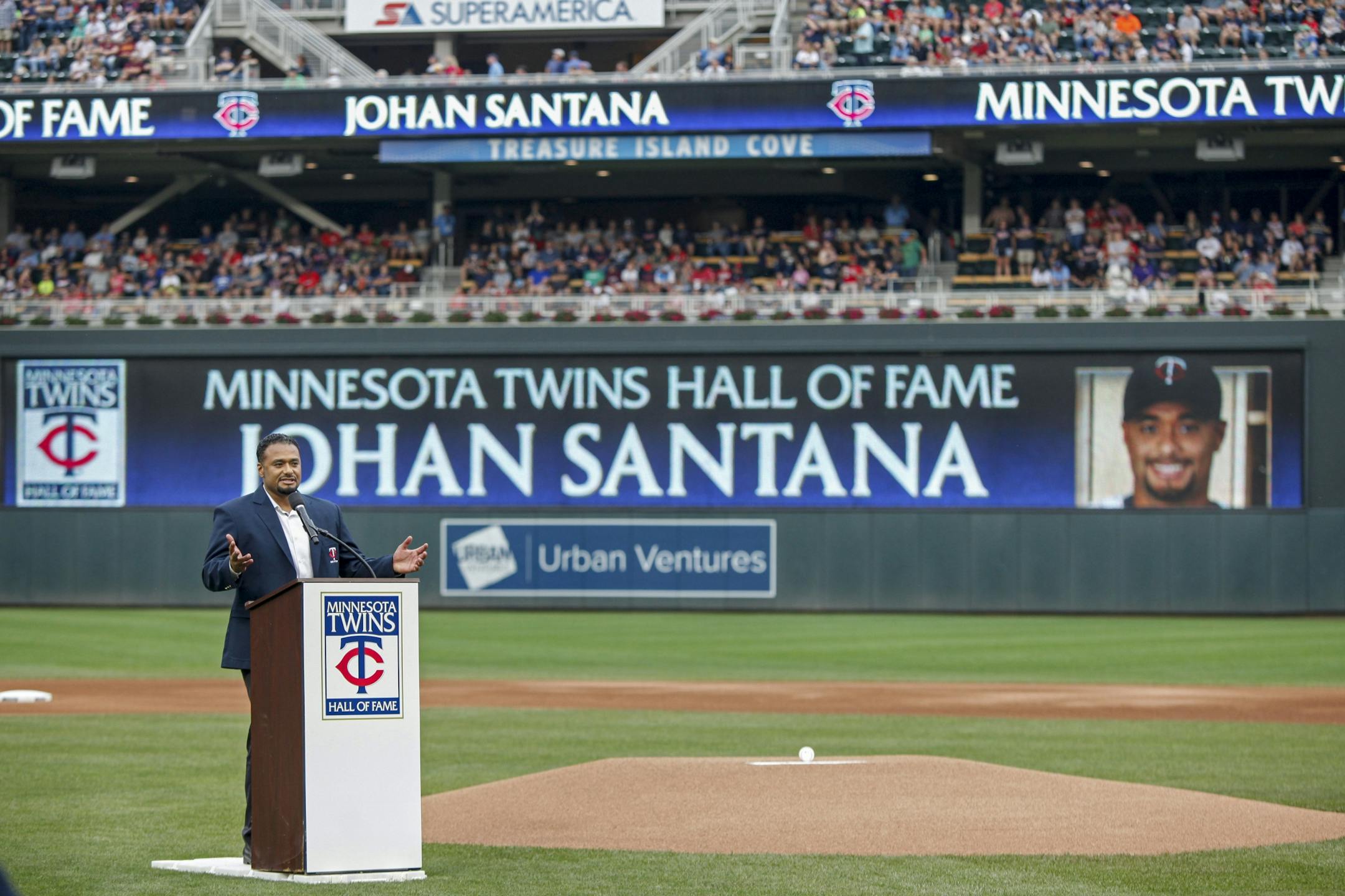 Former Twins pitcher Johan Santana speaks at his induction ceremony to the Minnesota Twins Hall of Fame before the baseball game with the Kansas City Royals on Saturday, Aug. 4, 2018, in Minneapolis.