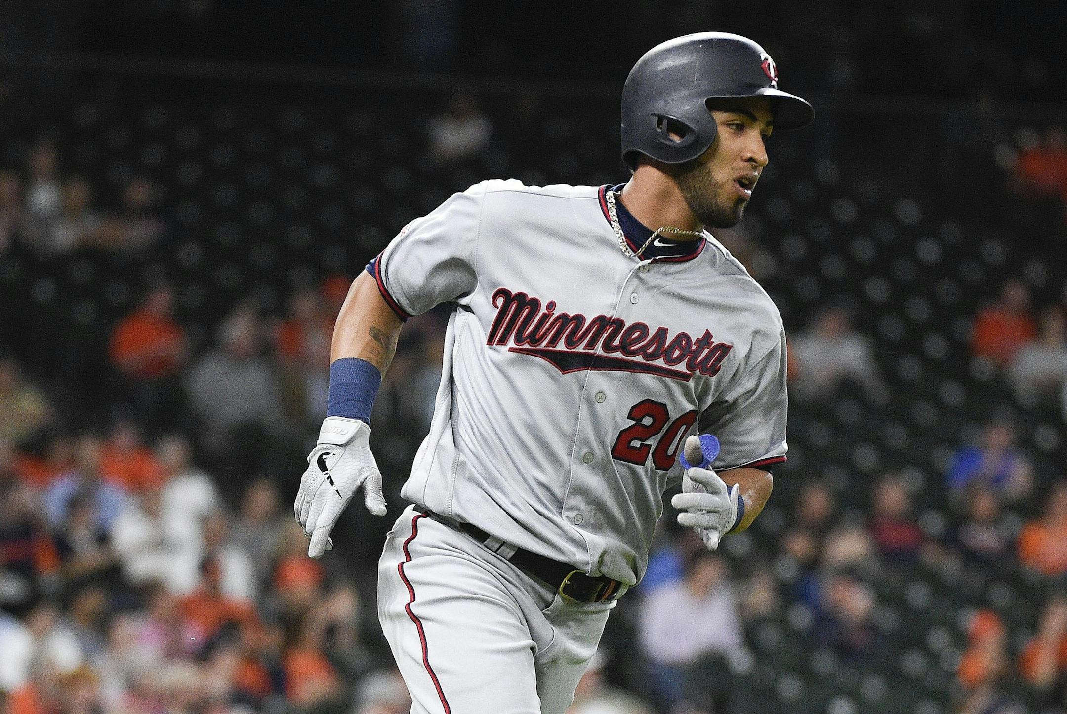 Minnesota Twins' Eddie Rosario rounds the bases after hitting a three-run home run off Houston Astros starting pitcher Wade Miley during the first inning of a baseball game, Tuesday, April 23, 2019, in Houston. (AP Photo/Eric Christian Smith)