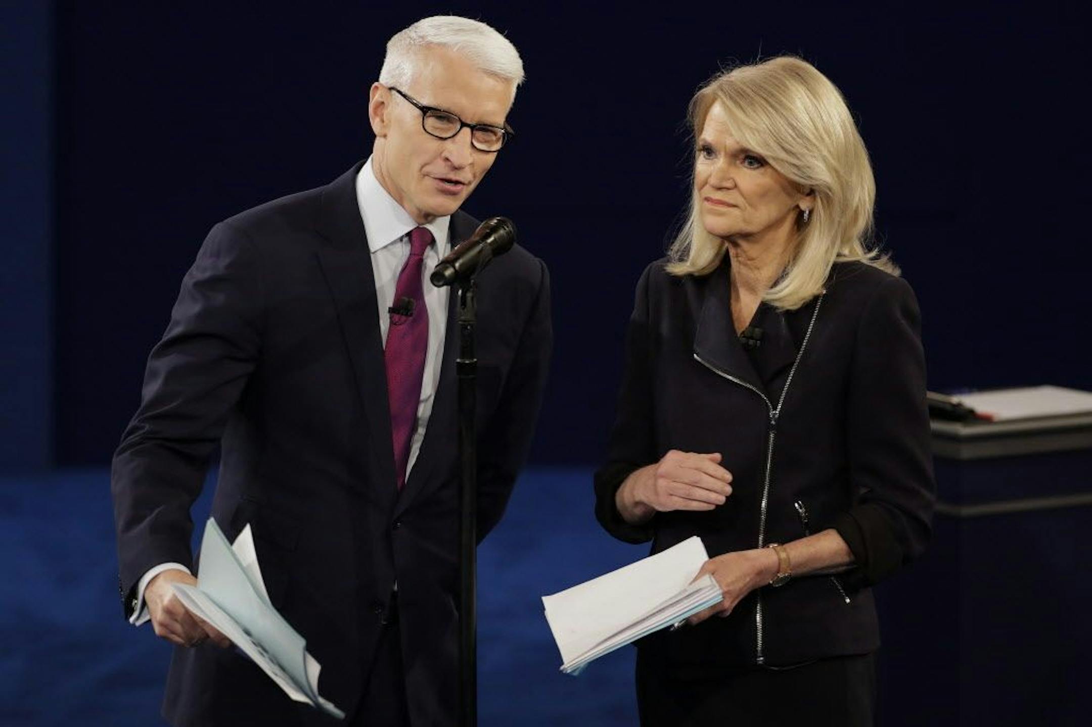 Moderators Anderson Cooper, of CNN, and Martha Raddatz, of ABC News talk to the audience before the second presidential debate at Washington University in St. Louis, Sunday, Oct. 9, 2016.