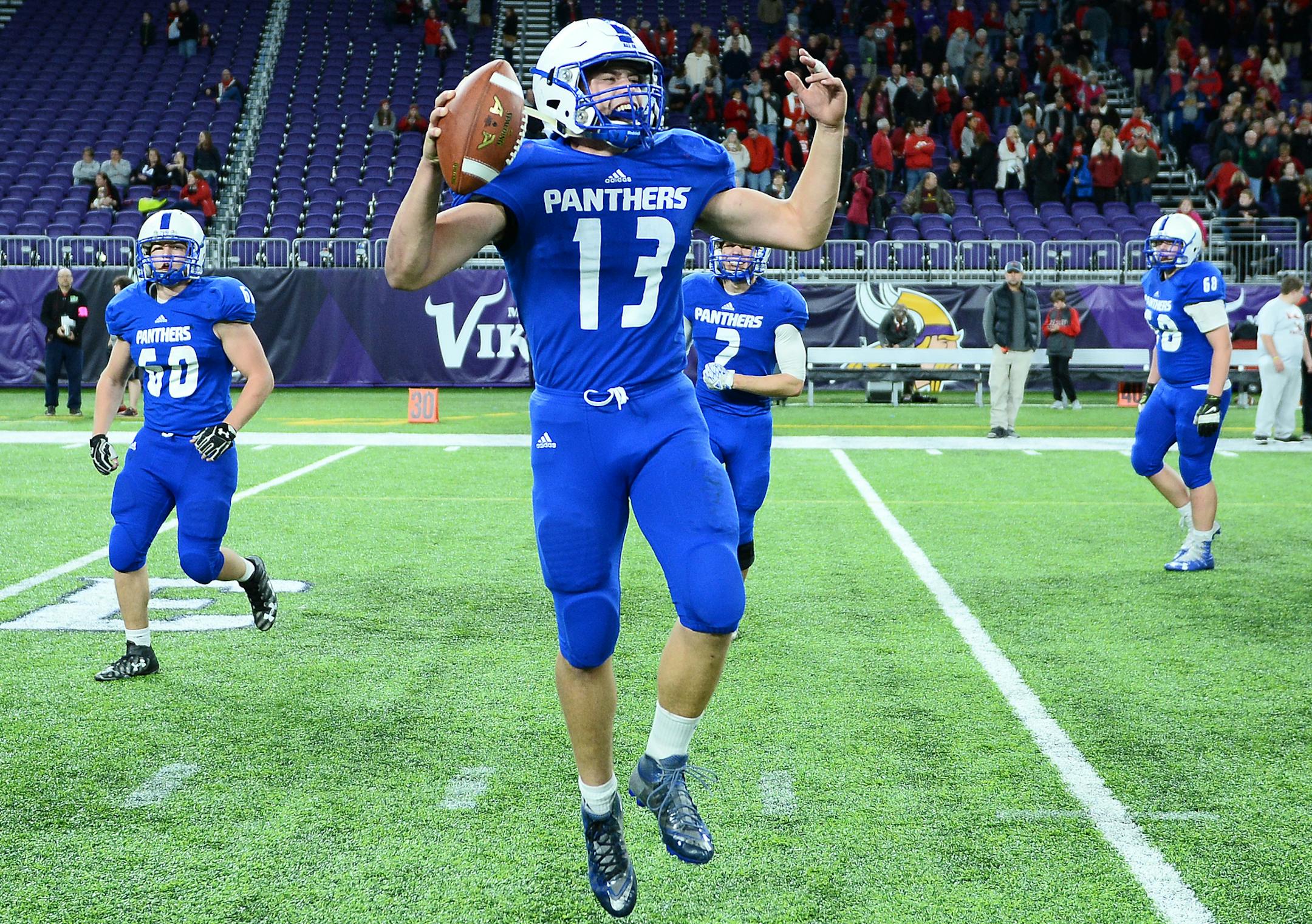 Spring Lake Park quarterback Zachary Ojile ( 13) celebrated his team's 14-0 victory over Mankato West in the 5A semis. ] (AARON LAVINSKY/STAR TRIBUNE) aaron.lavinsky@startribune.com Mankato West played Spring Lake Park in a Class 5A semifinal game of the state tournament on Saturday, Nov. 19, 2016 at US Bank Stadium in Minneapolis, Minn.