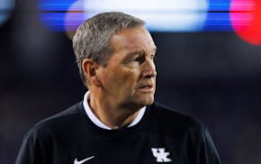 University of Kentucky Director of Athletics Mitch Barnhart watches an NCAA college football game between Kentucky and Mississippi State in Lexington,