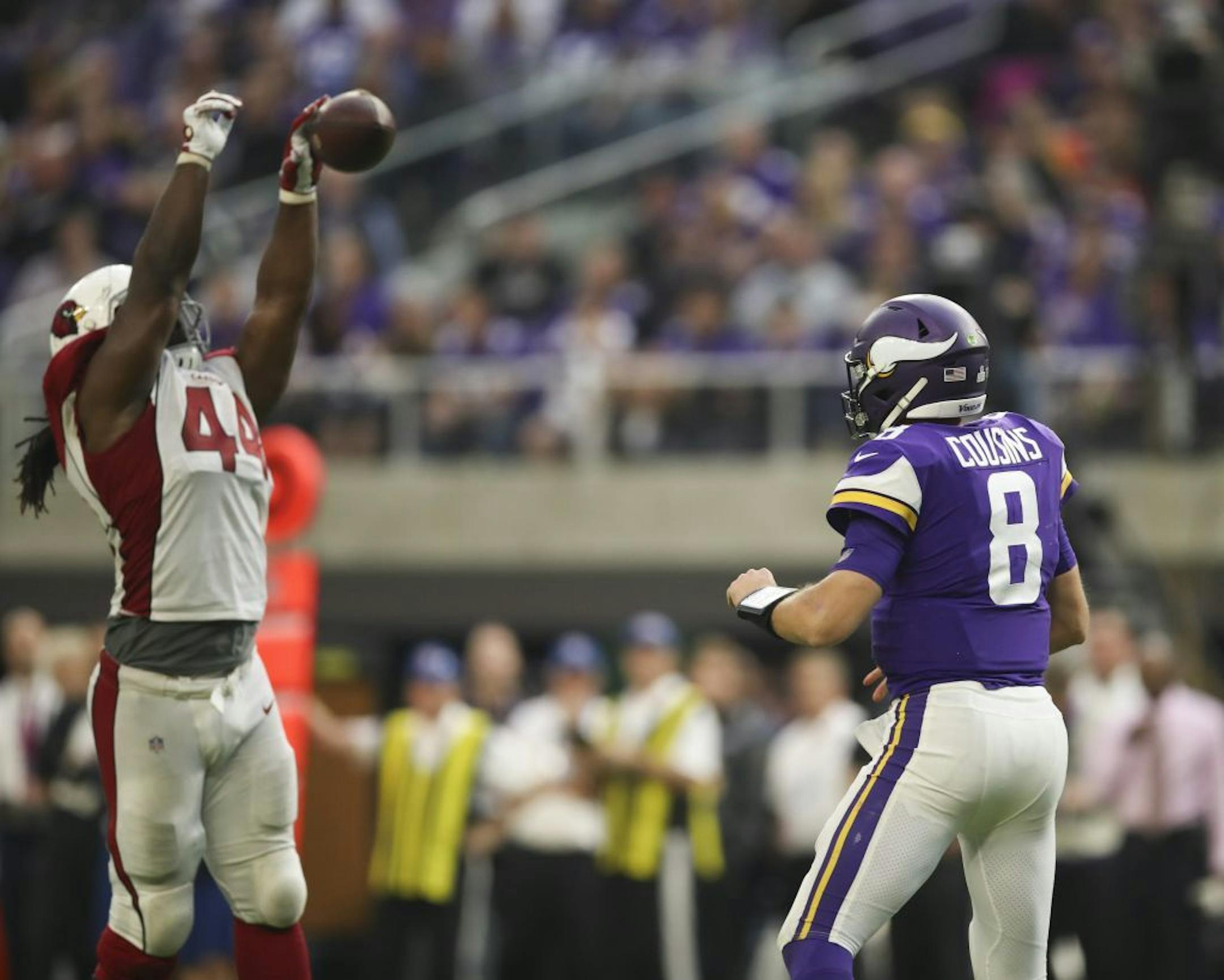 Arizona Cardinals defensive end Markus Golden (44) batted down a fourth quarter pass by Minnesota Vikings quarterback Kirk Cousins (8).