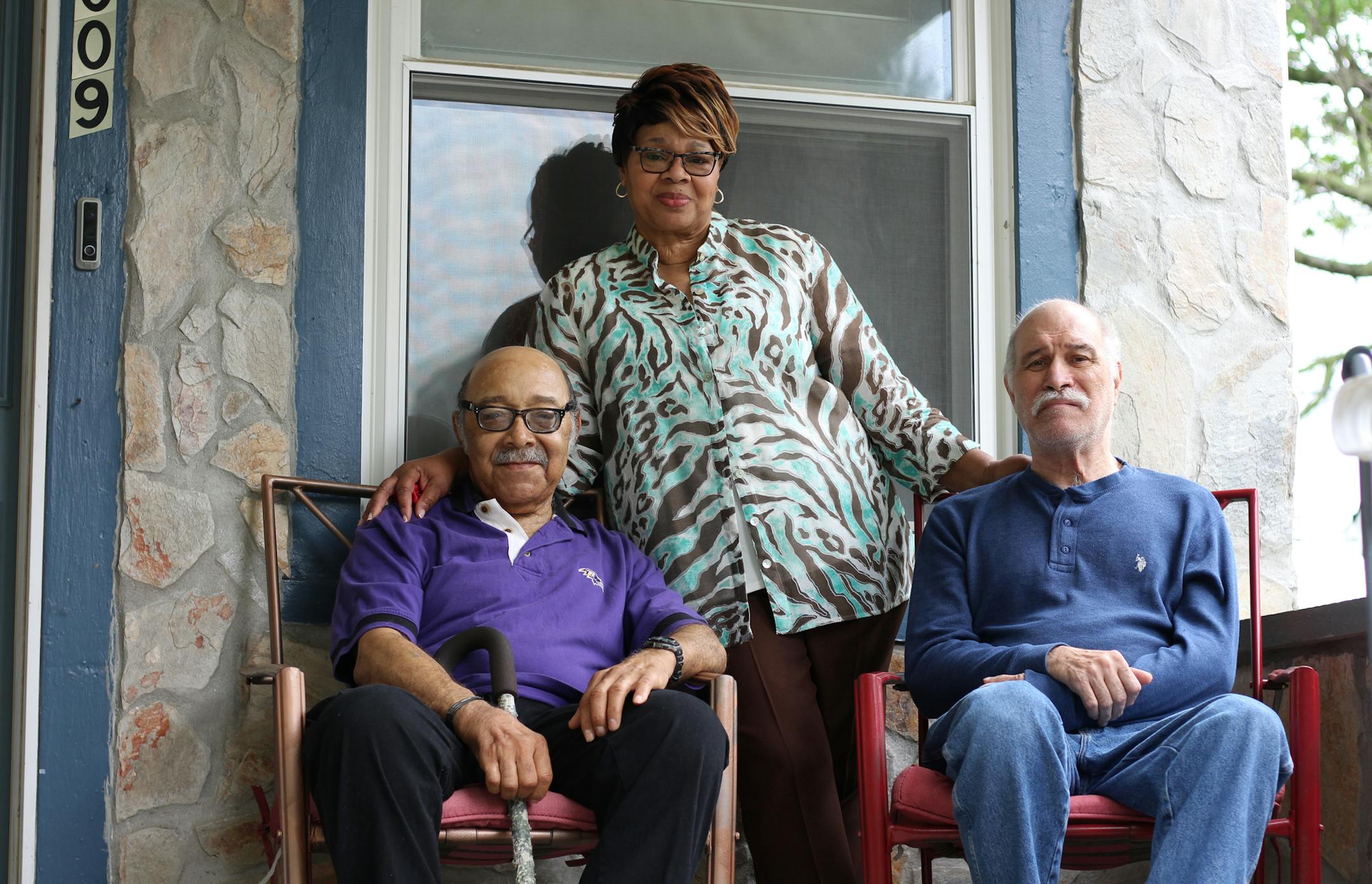 Joann West calls taking care of Vietnam War veterans Ralph Stepney, left, and Frank Hundt at her home in Baltimore a "joy." MUST CREDIT: Lynne Shallcross, Kaiser Health News